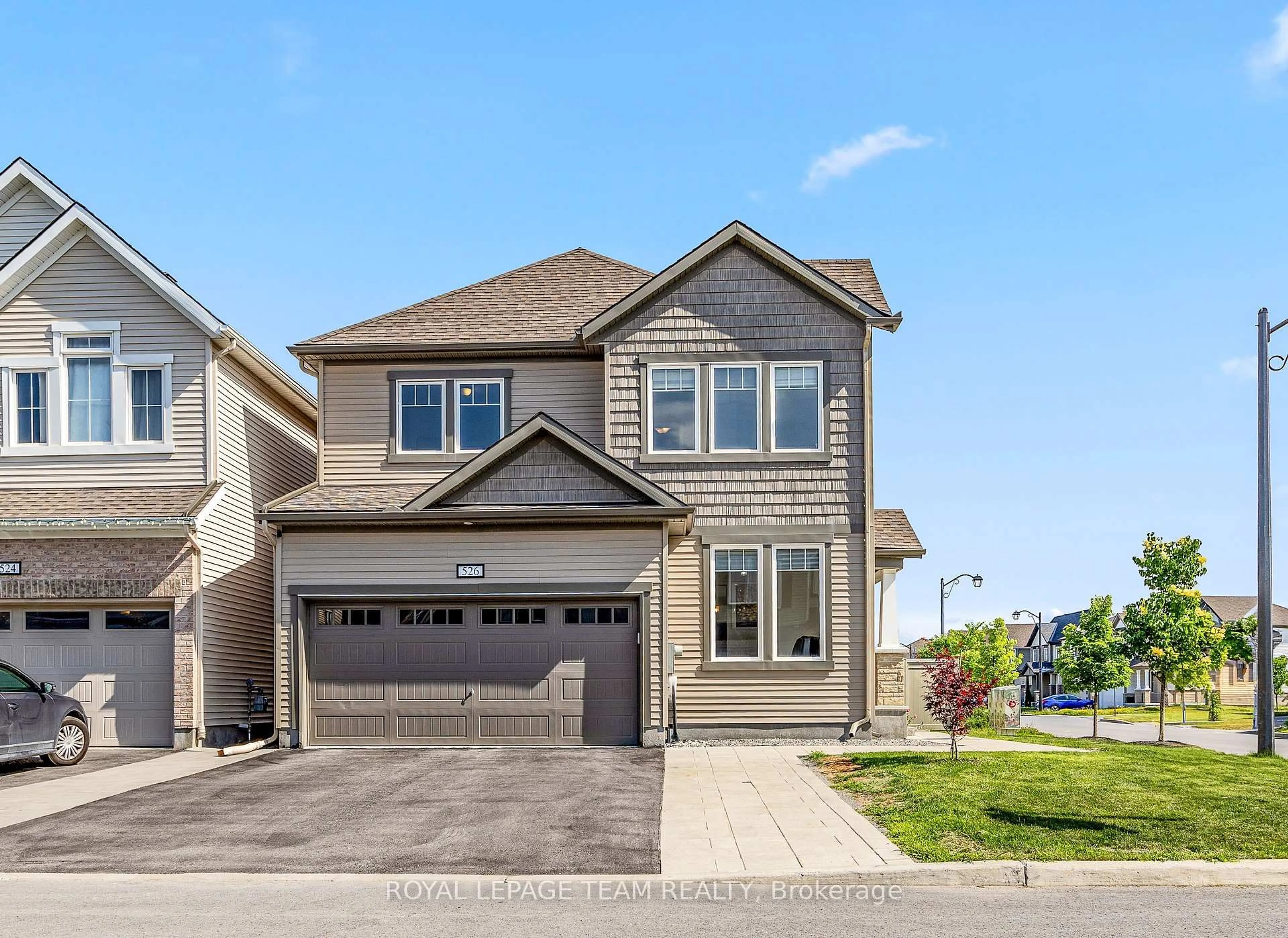 Home with vinyl exterior material, street for 526 Alcor Terr, Ottawa Ontario K2J 6N6