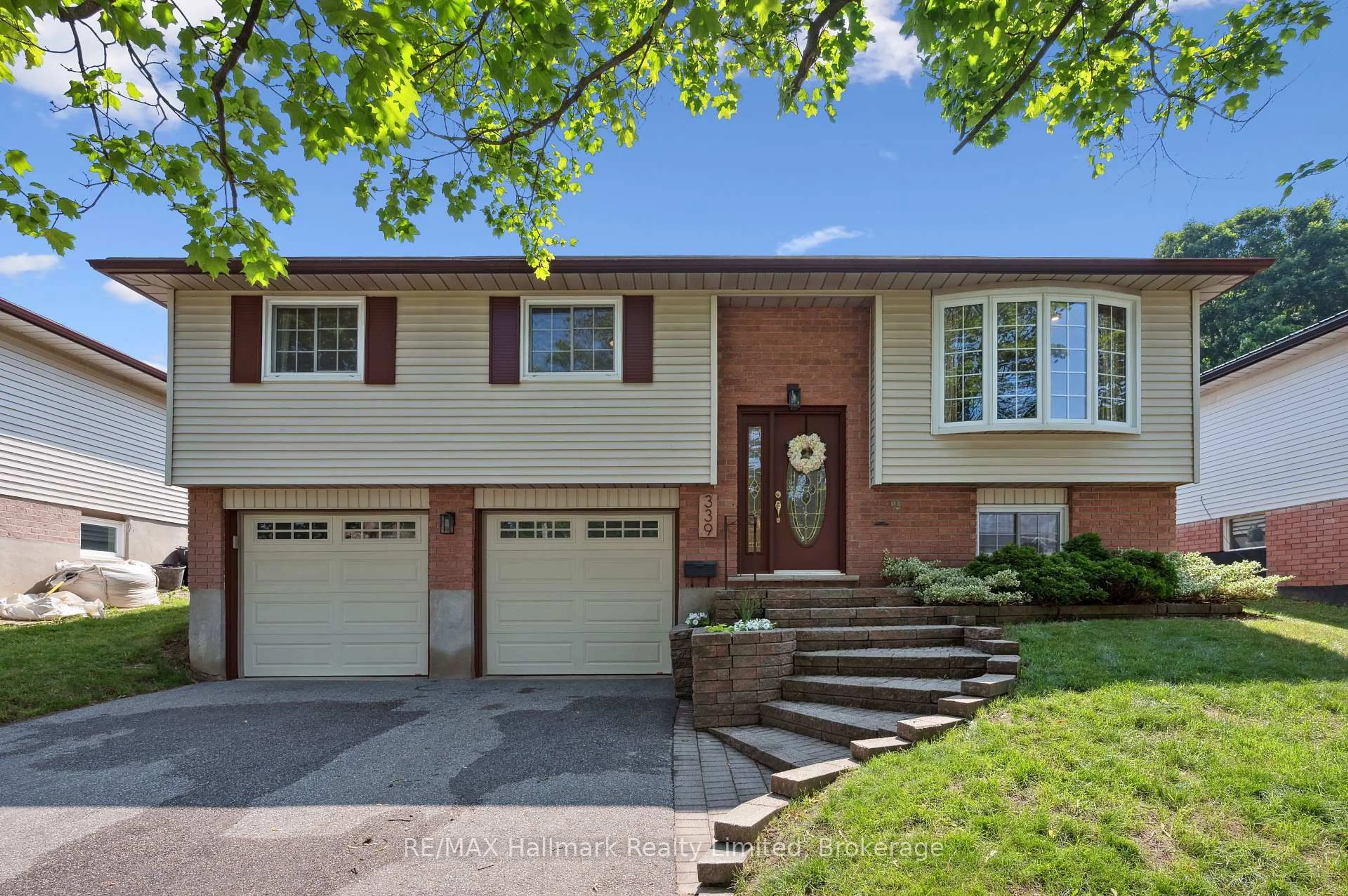 Home with vinyl exterior material, street for 339 Imperial Rd, Guelph Ontario N1K 1L7