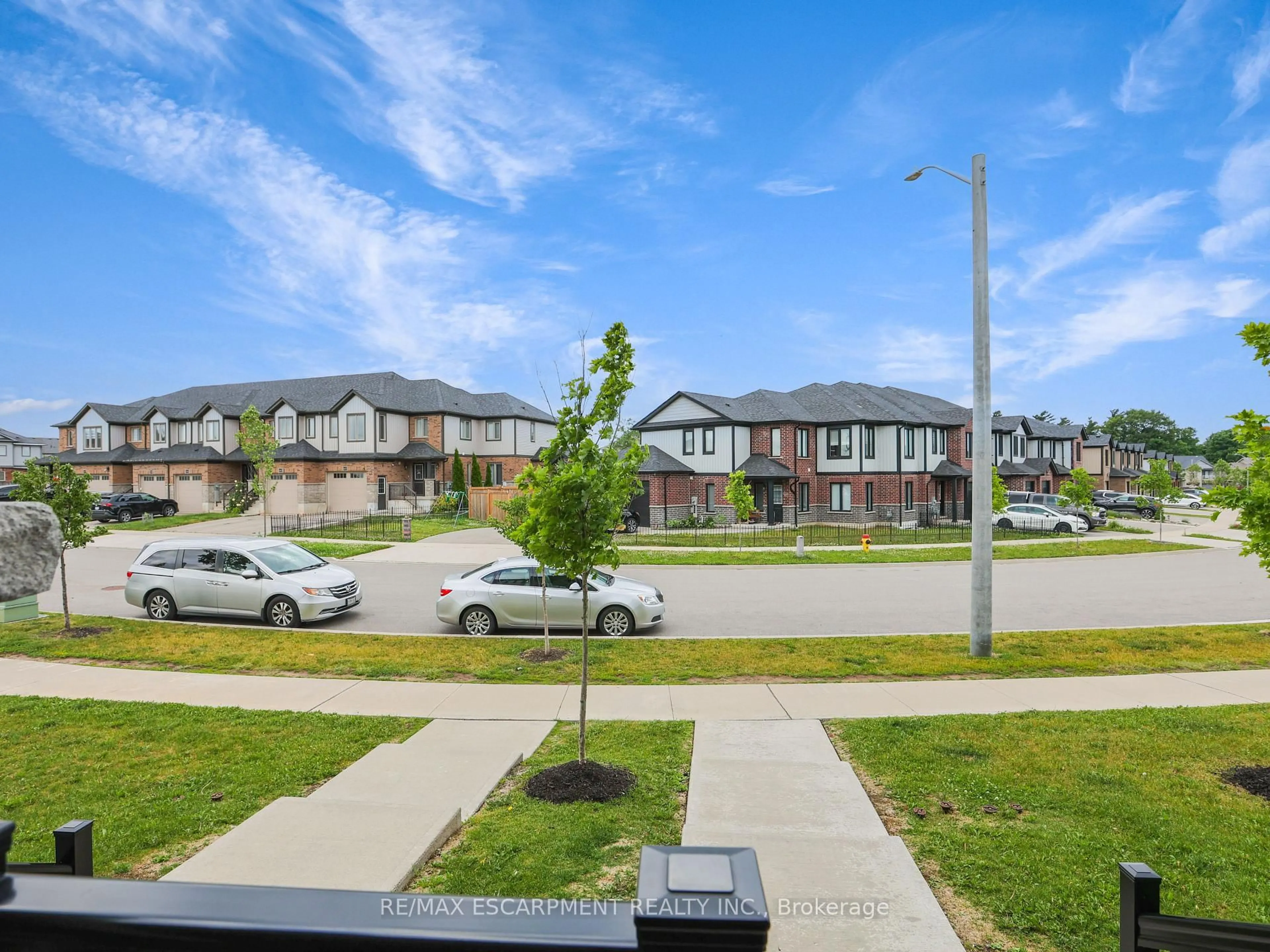 A pic from outside/outdoor area/front of a property/back of a property/a pic from drone, street for 148 Rochefort St #Unit C, Kitchener Ontario N2R 0P5