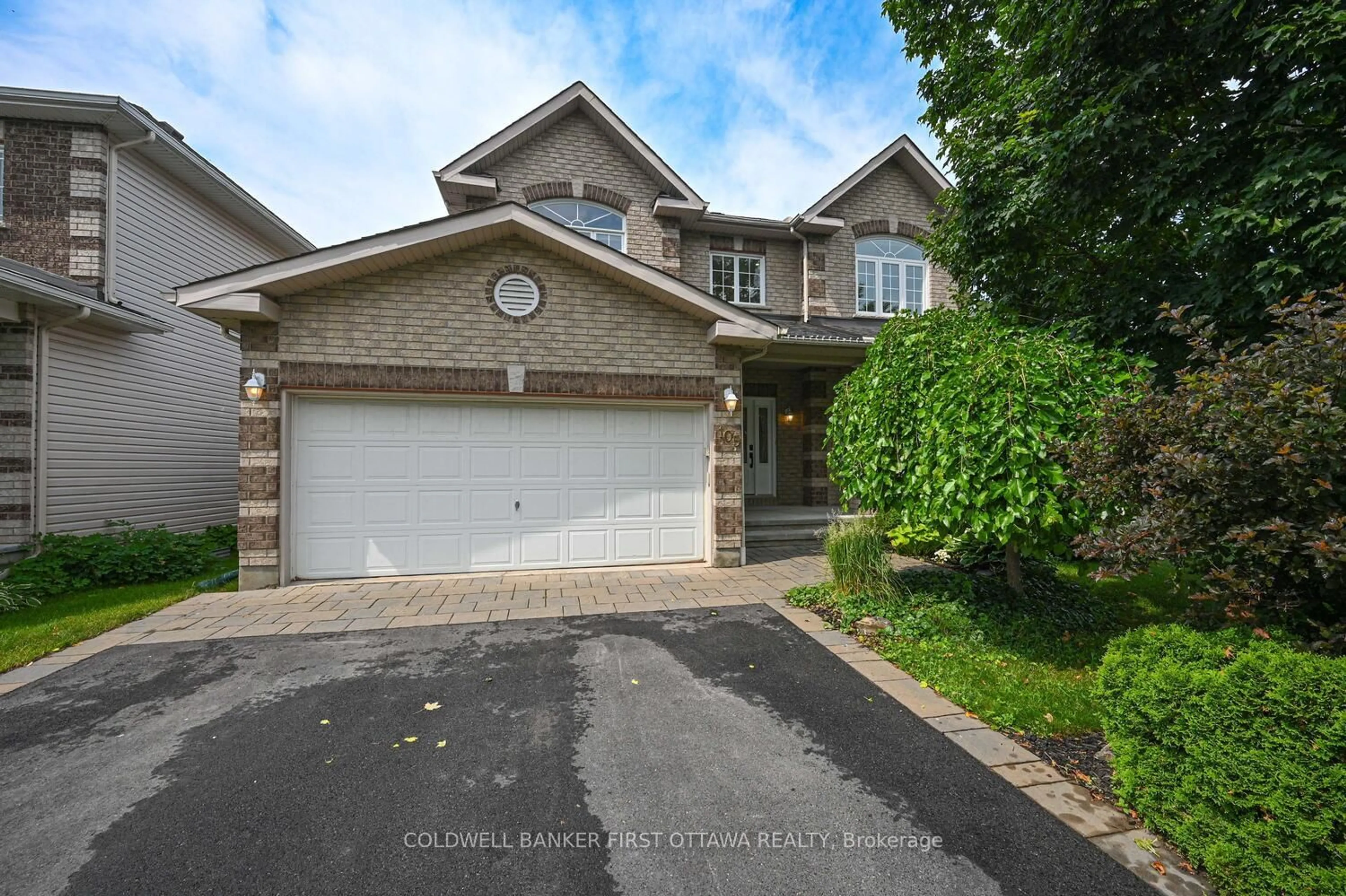 Home with brick exterior material, street for 105 Sirocco Cres, Stittsville Ontario K2S 2C9