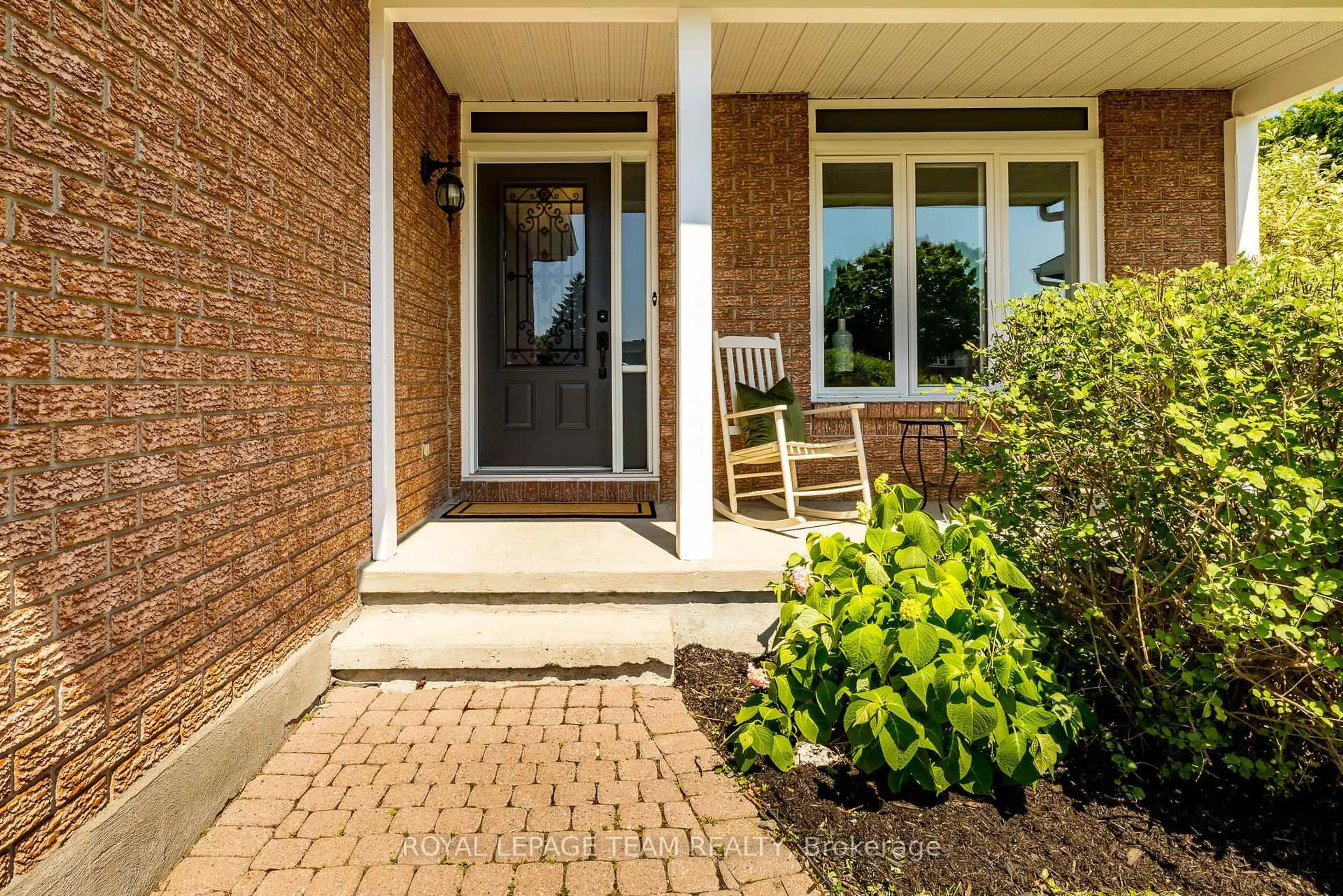 Home with brick exterior material, street for 30 Halley St, Barrhaven Ontario K2J 3W2