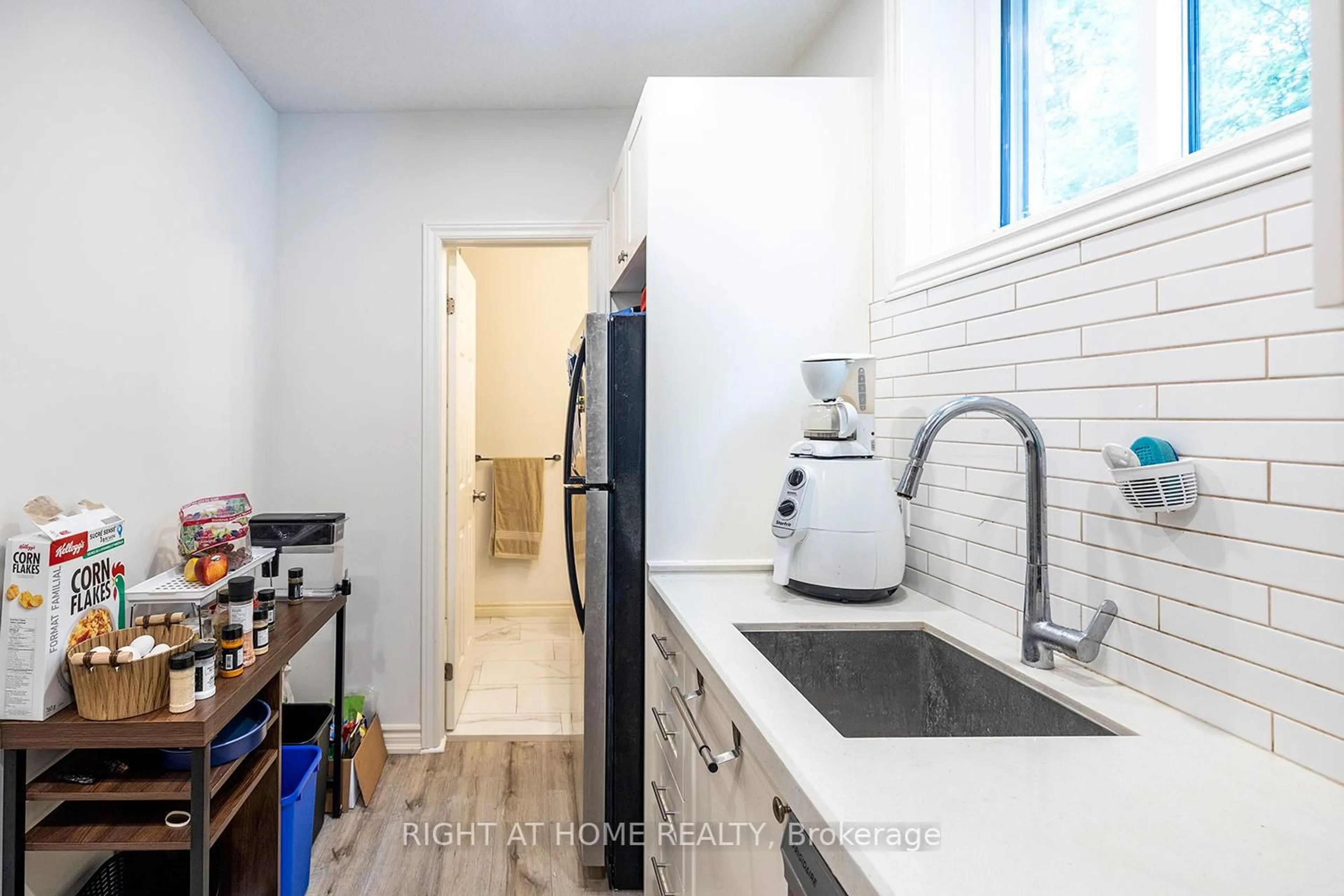 Kitchen with laundary machines, ceramic/tile floor for 164 Heiman St St #7A, Kitchener Ontario N2M 0B8