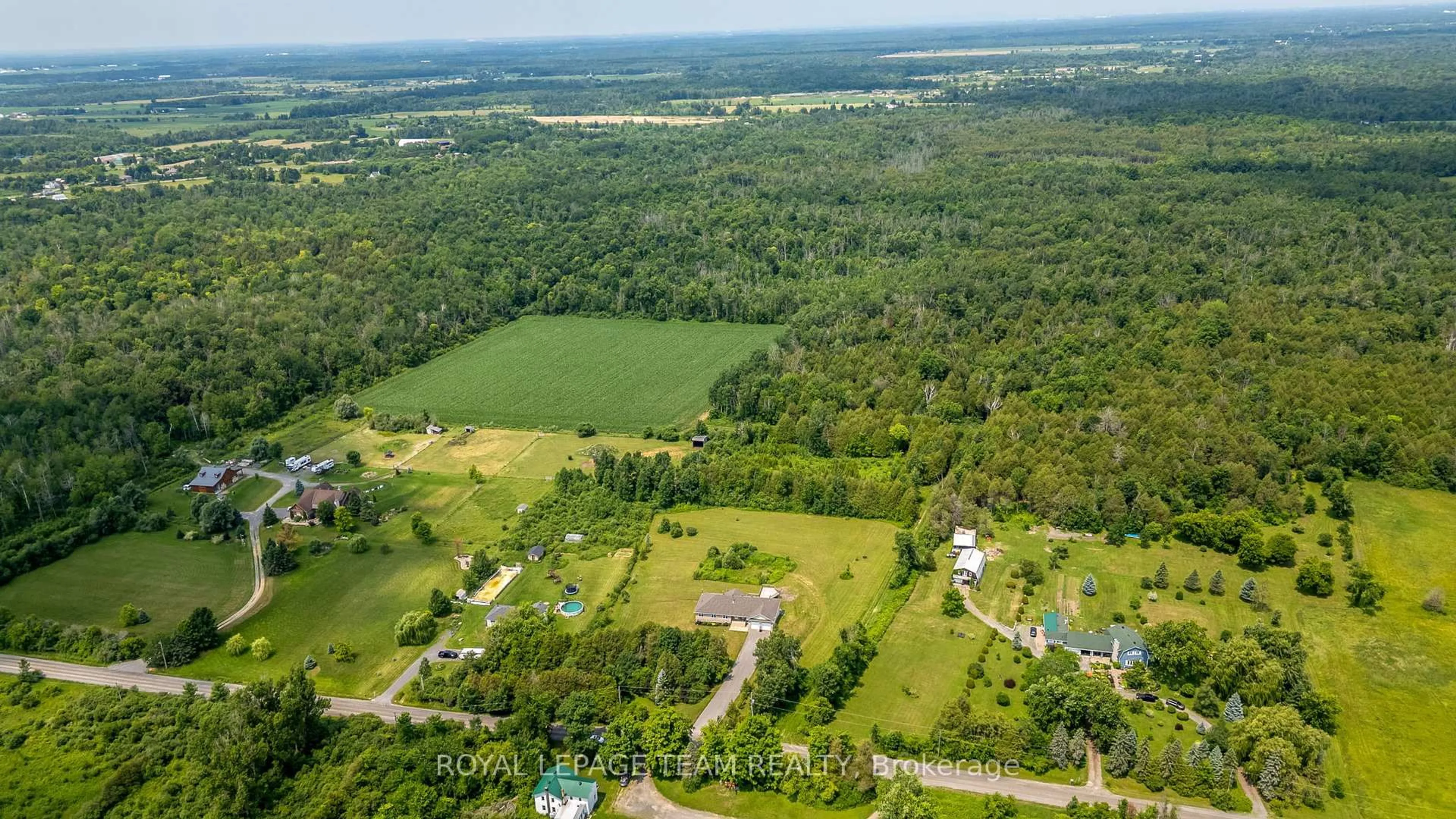 A pic from outside/outdoor area/front of a property/back of a property/a pic from drone, water/lake/river/ocean view for 6473 Springhill Rd, Osgoode Ontario K0A 2W0