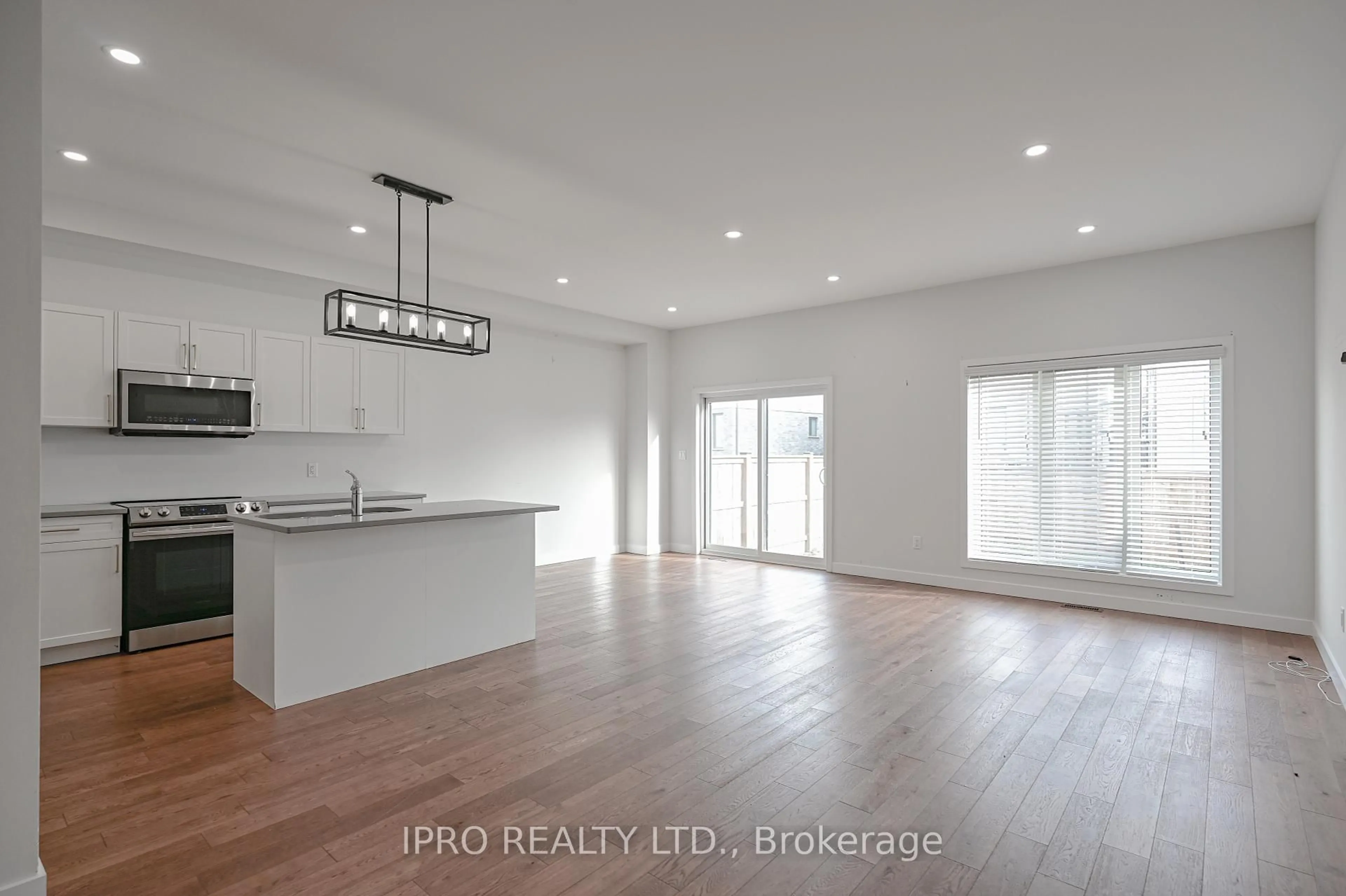Open concept kitchen, wood/laminate floor for 3758 SOUTHBRIDGE Ave, London South Ontario N6L 0G4