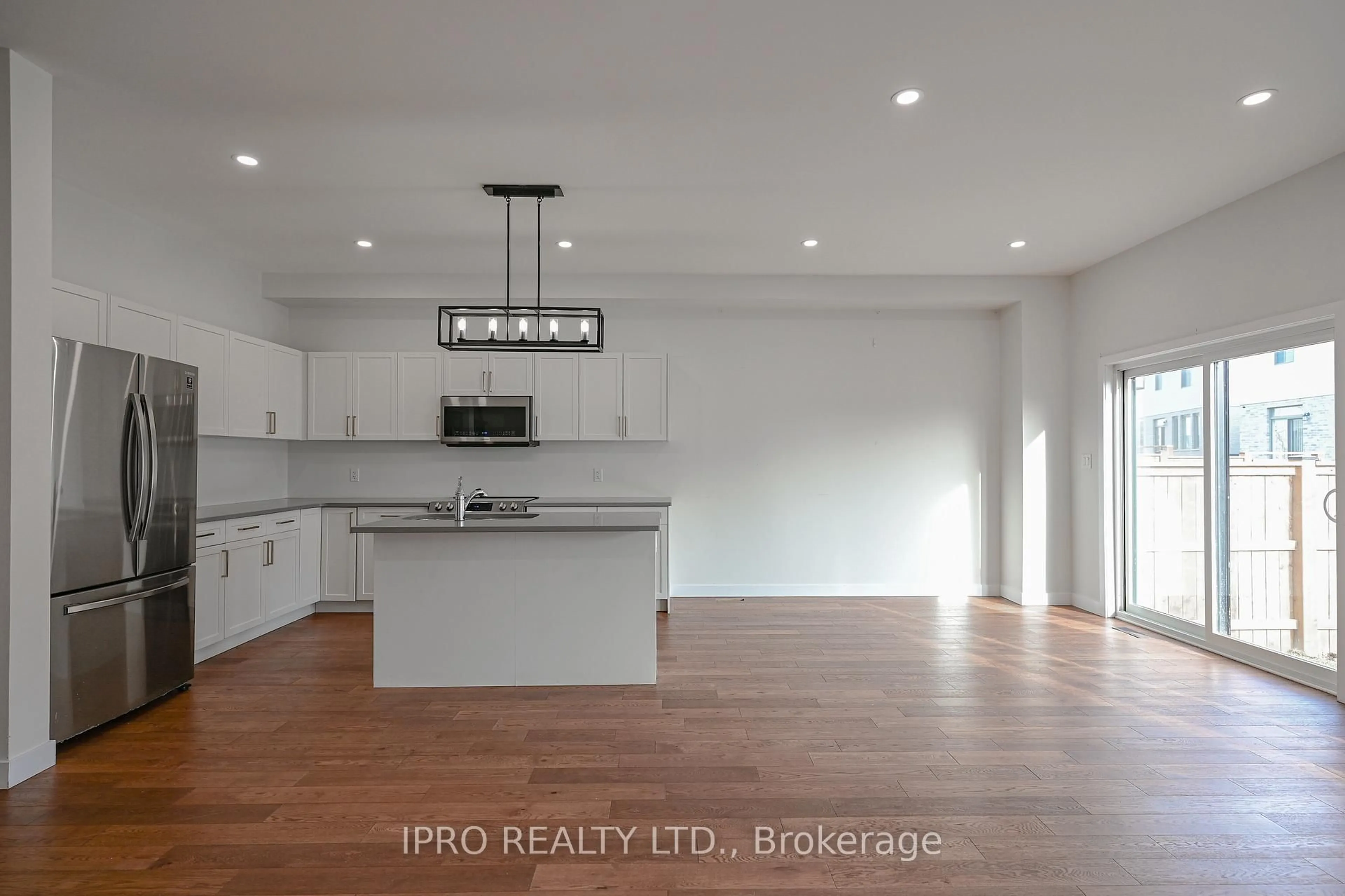 Open concept kitchen, wood/laminate floor for 3758 SOUTHBRIDGE Ave, London South Ontario N6L 0G4