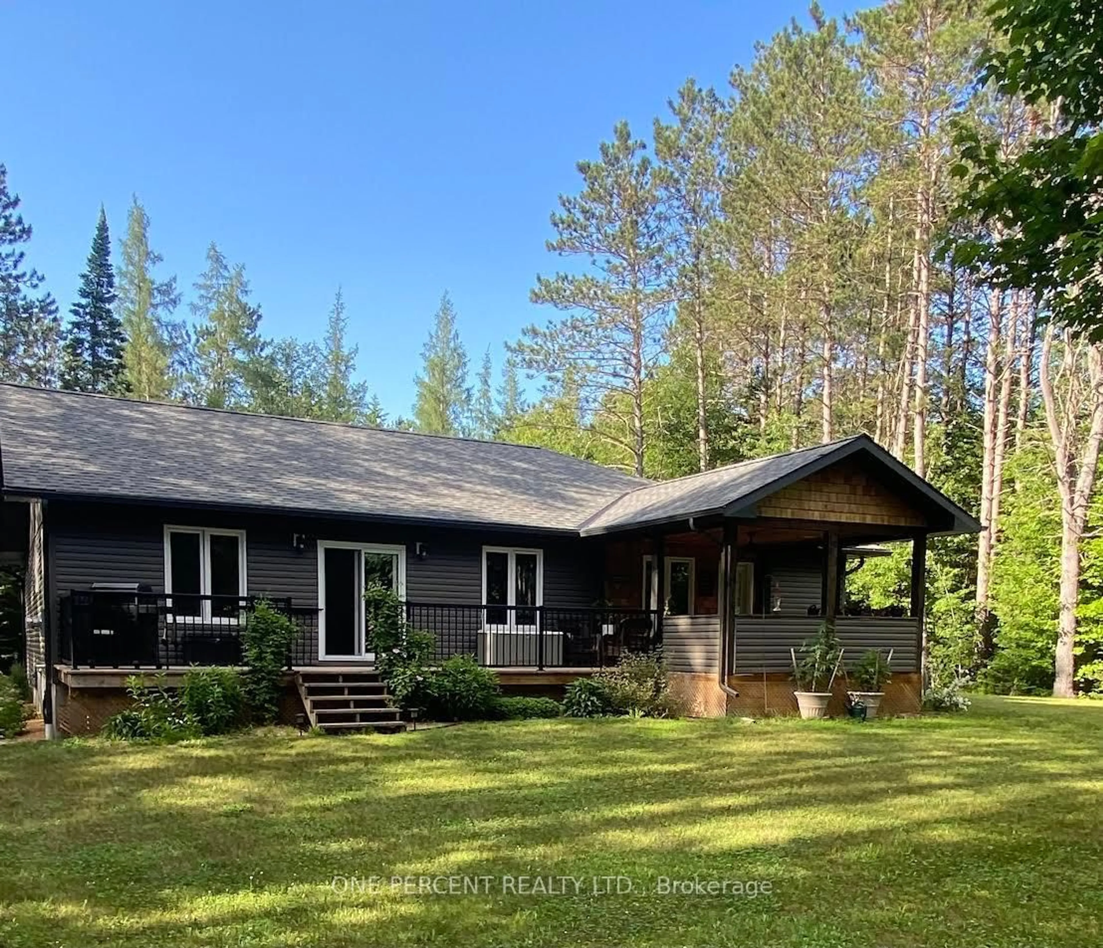 A pic from outside/outdoor area/front of a property/back of a property/a pic from drone, unknown for 2241 Lone Pine Dr, Huntsville Ontario P0B 1L0