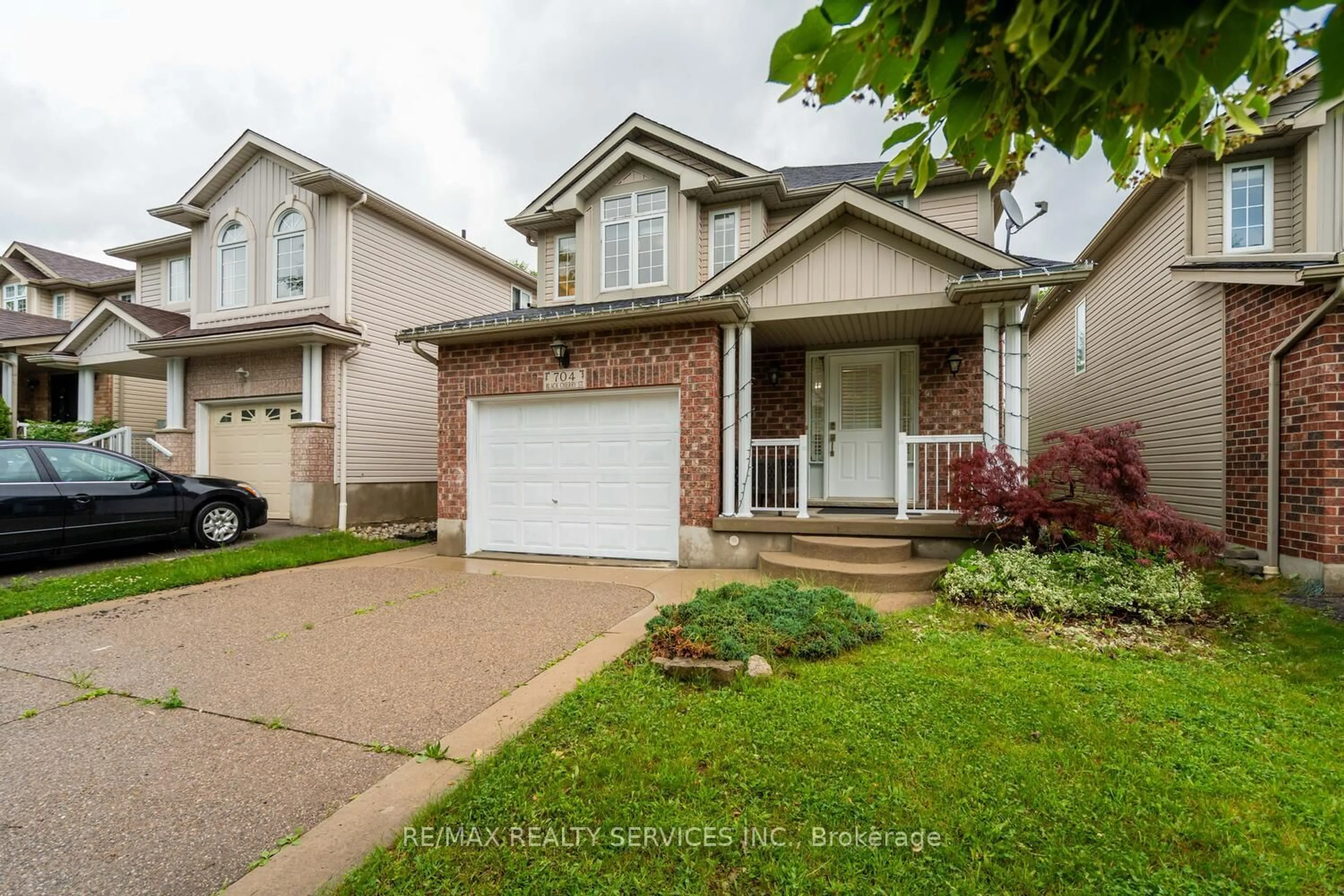 Home with vinyl exterior material, street for 704 Black Cherry St, Waterloo Ontario N2V 2P3