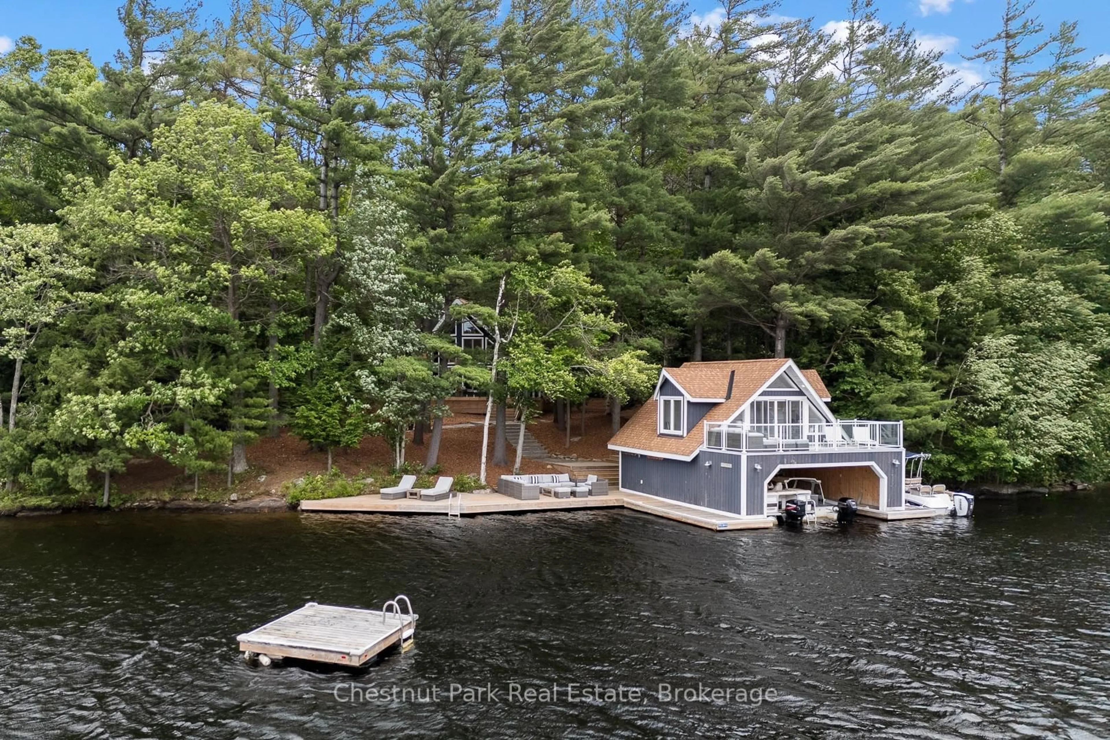 A pic from outside/outdoor area/front of a property/back of a property/a pic from drone, water/lake/river/ocean view for 44 Miller Island, Gravenhurst Ontario P1P 1R2