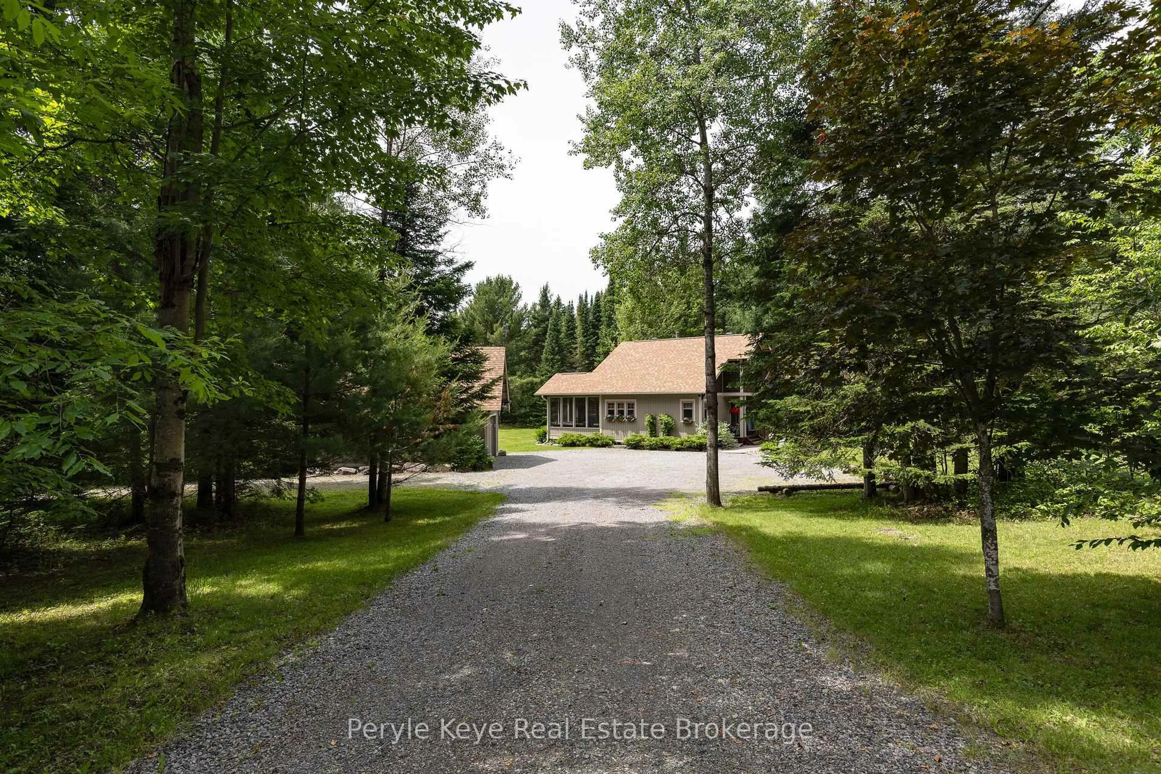 A pic from outside/outdoor area/front of a property/back of a property/a pic from drone, forest/trees view for 394 Clearwater Lake Rd, Huntsville Ontario P0B 1L0