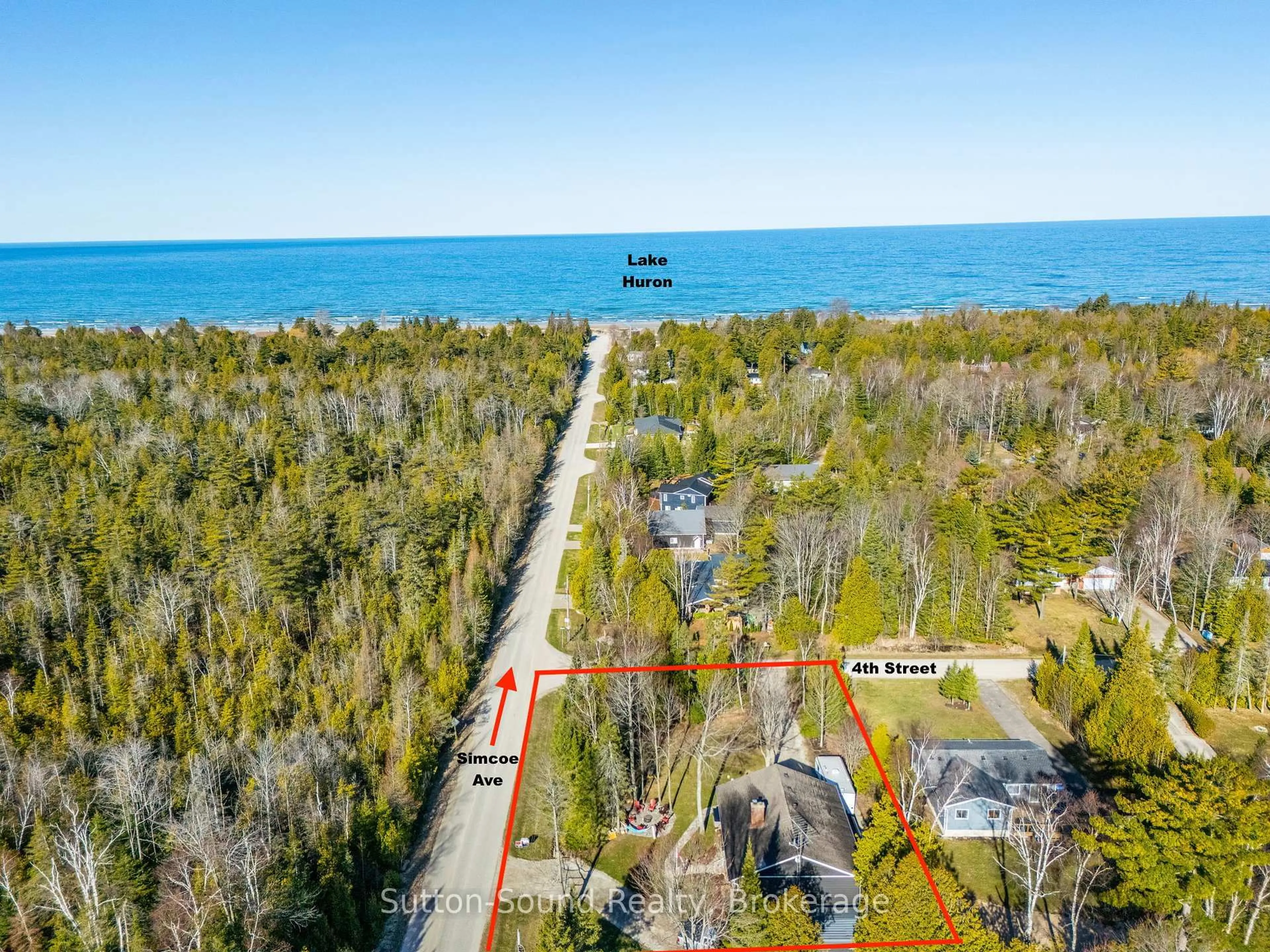 A pic from outside/outdoor area/front of a property/back of a property/a pic from drone, water/lake/river/ocean view for 403 Simcoe Ave, South Bruce Peninsula Ontario N0H 2G0