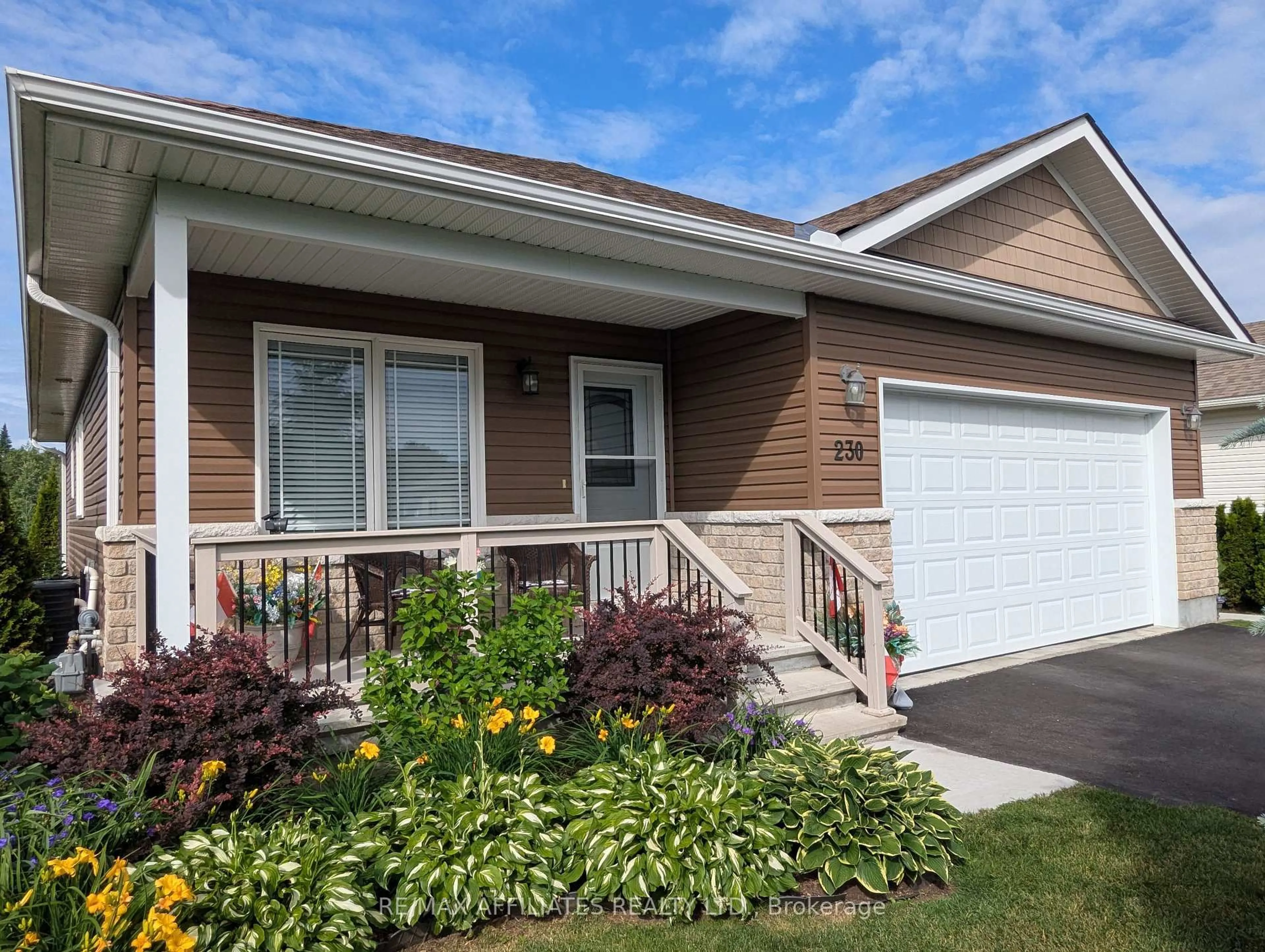 Home with vinyl exterior material, street for 230 Wood Ave, Smiths Falls Ontario K7A 5G9