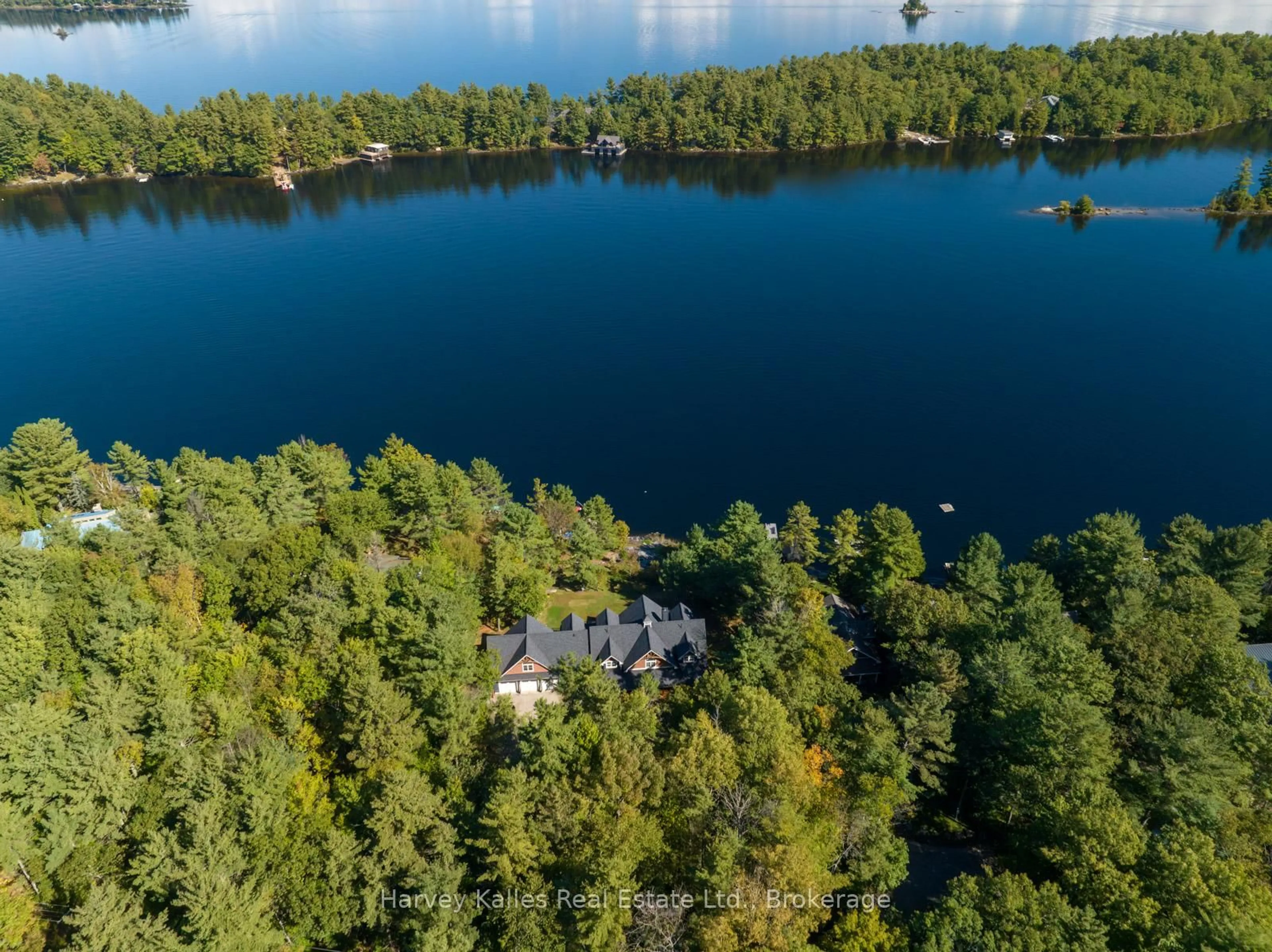 A pic from outside/outdoor area/front of a property/back of a property/a pic from drone, water/lake/river/ocean view for 1045 LAKESHORE Dr, Gravenhurst Ontario P1P 1R2