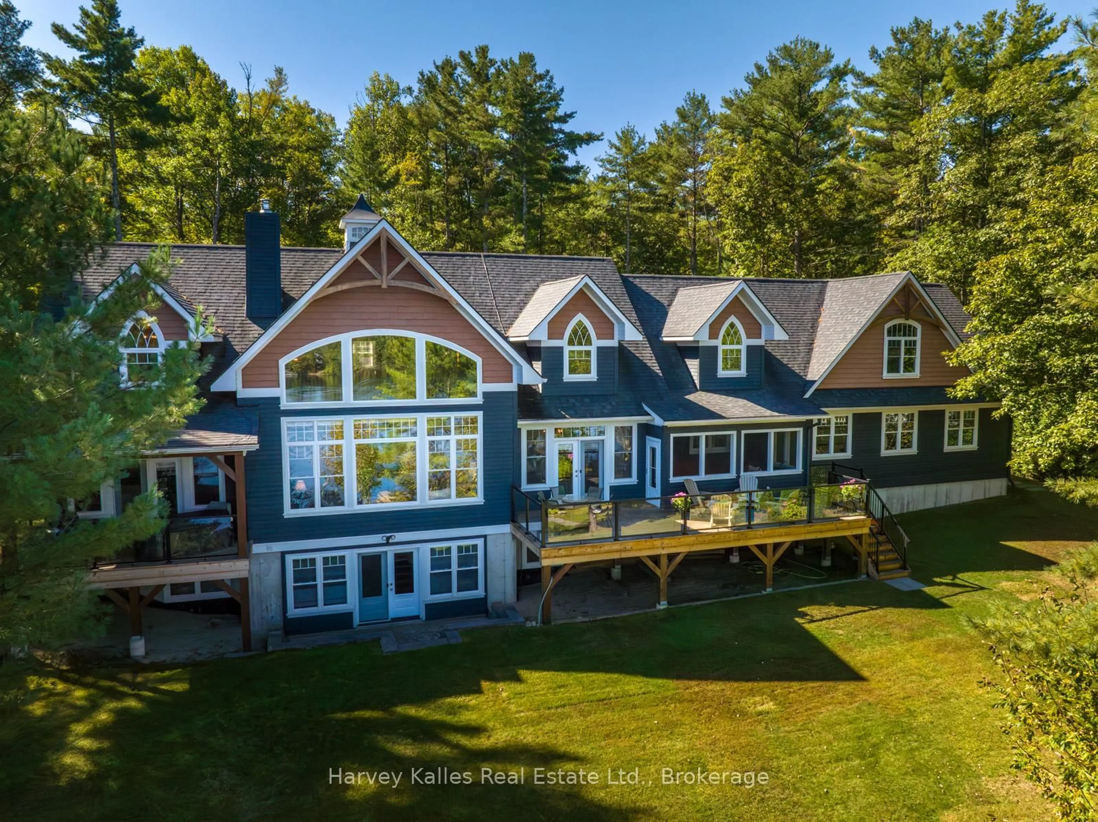 A pic from outside/outdoor area/front of a property/back of a property/a pic from drone, water/lake/river/ocean view for 1045 LAKESHORE Dr, Gravenhurst Ontario P1P 1R2