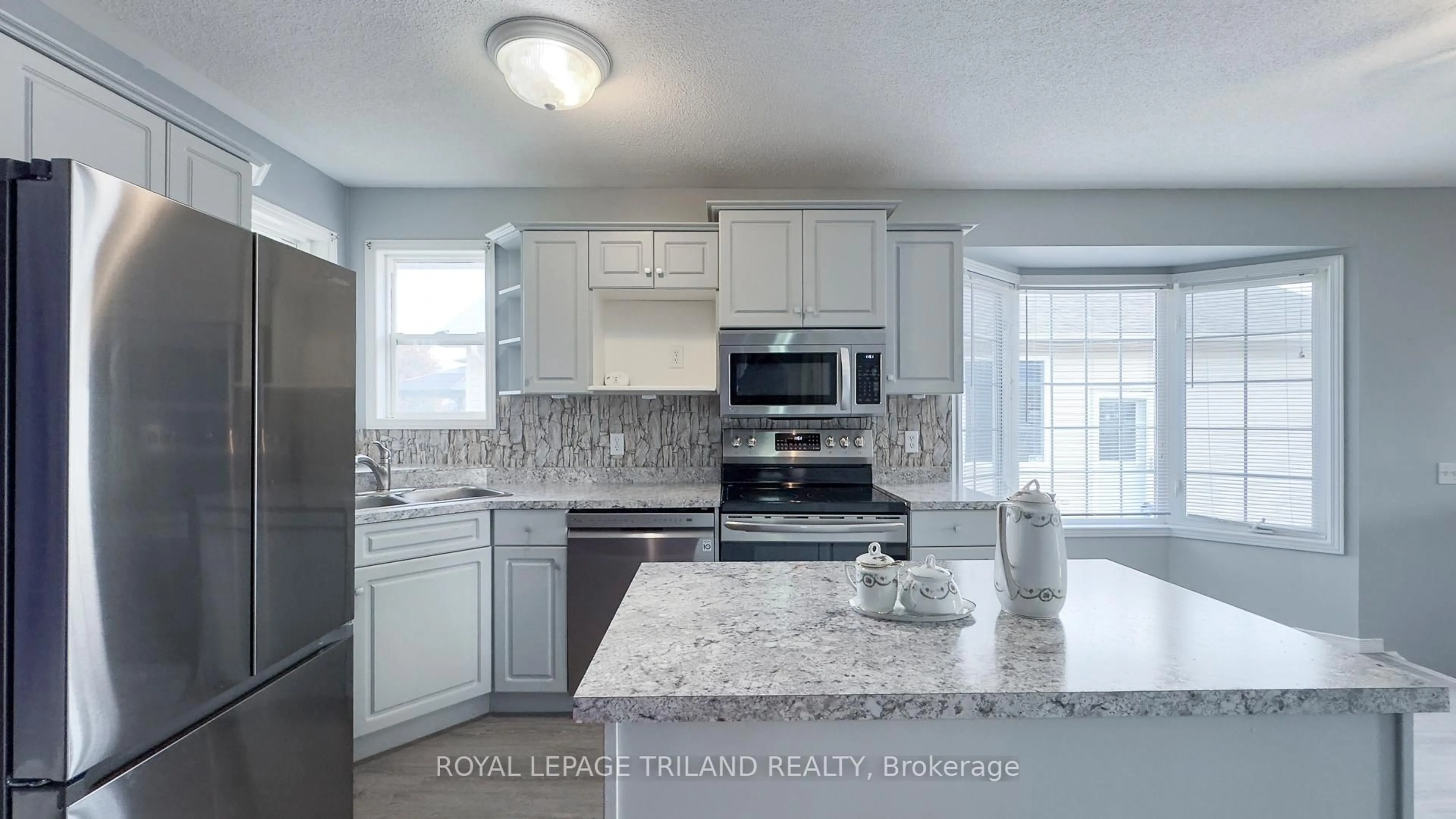 Open concept kitchen, ceramic/tile floor for 41850 James St, Southwold Ontario N5P 4L6