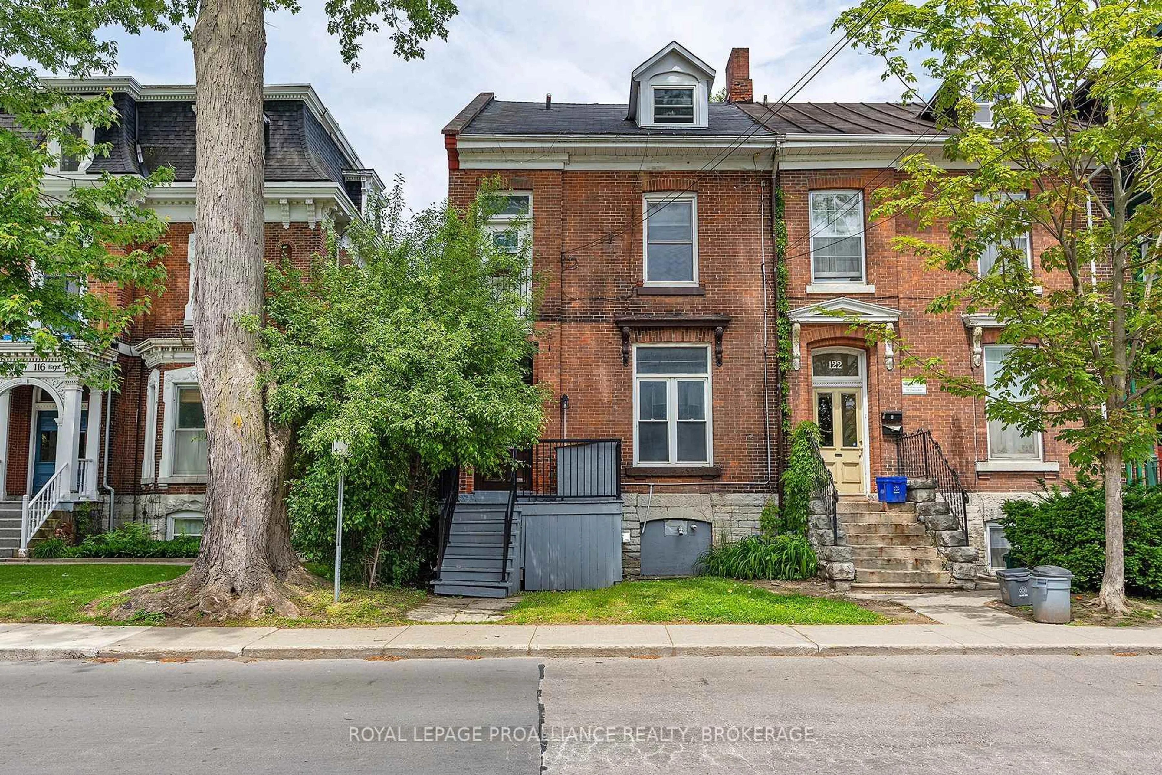 Home with brick exterior material, street for 120 Bagot St, Kingston Ontario K7L 3E5