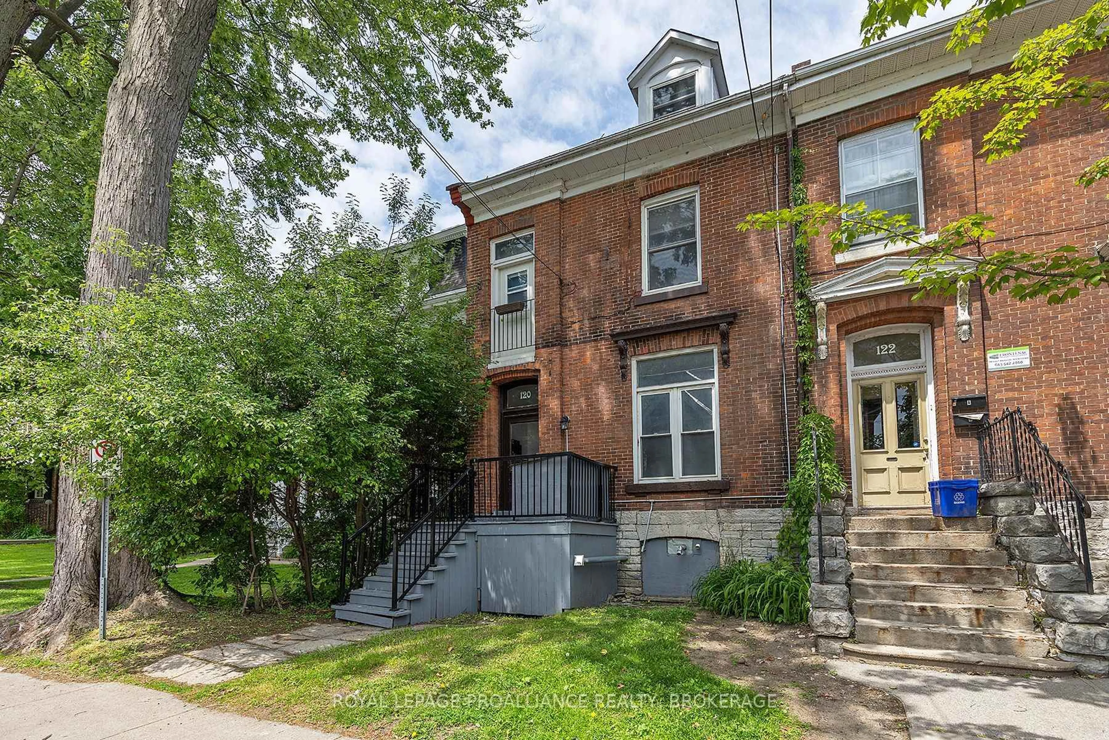 Home with brick exterior material, street for 120 Bagot St, Kingston Ontario K7L 3E5