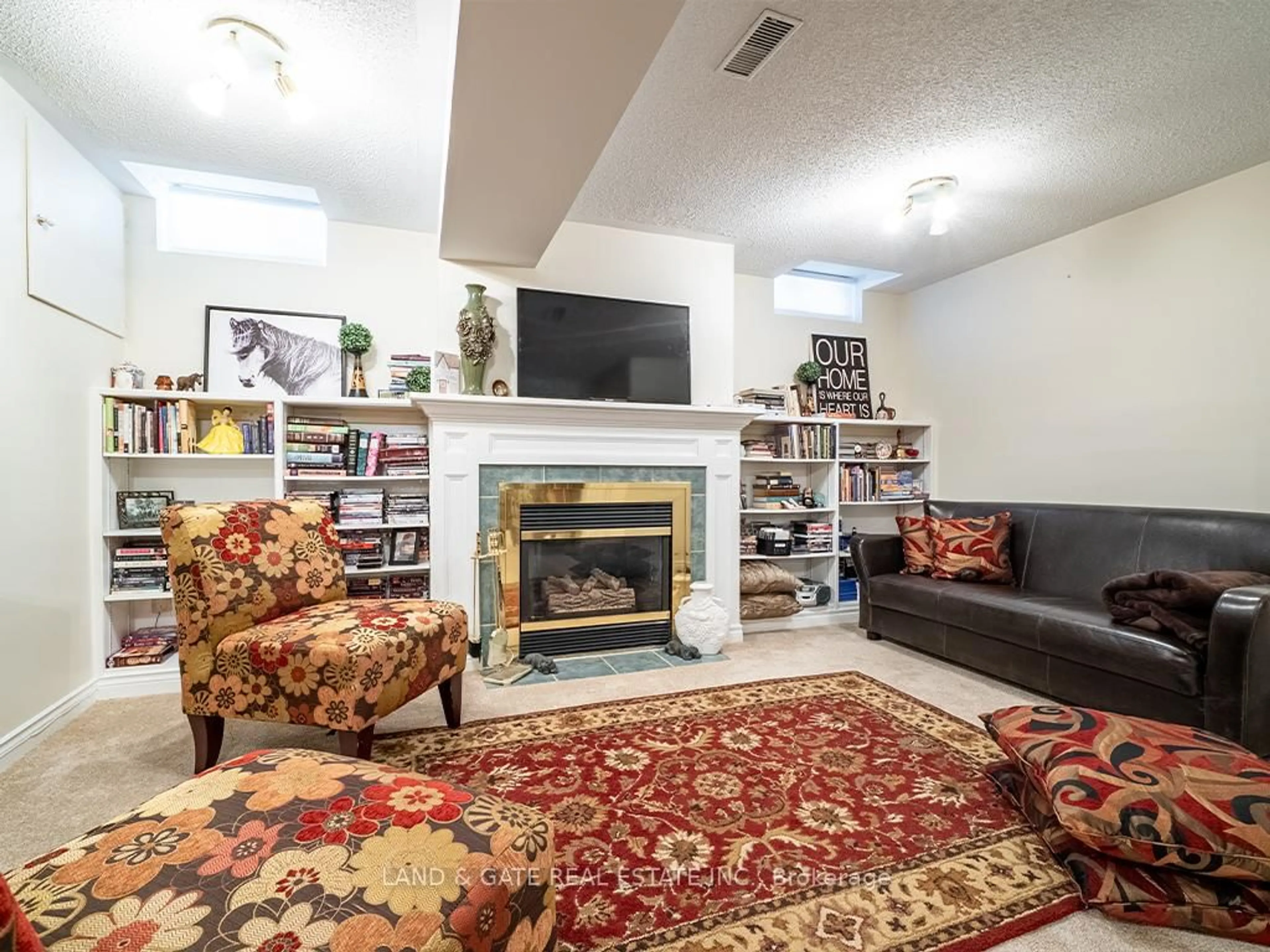 Living room with furniture, carpet floor for 245 Elgin St #502, Cobourg Ontario K9A 5M1