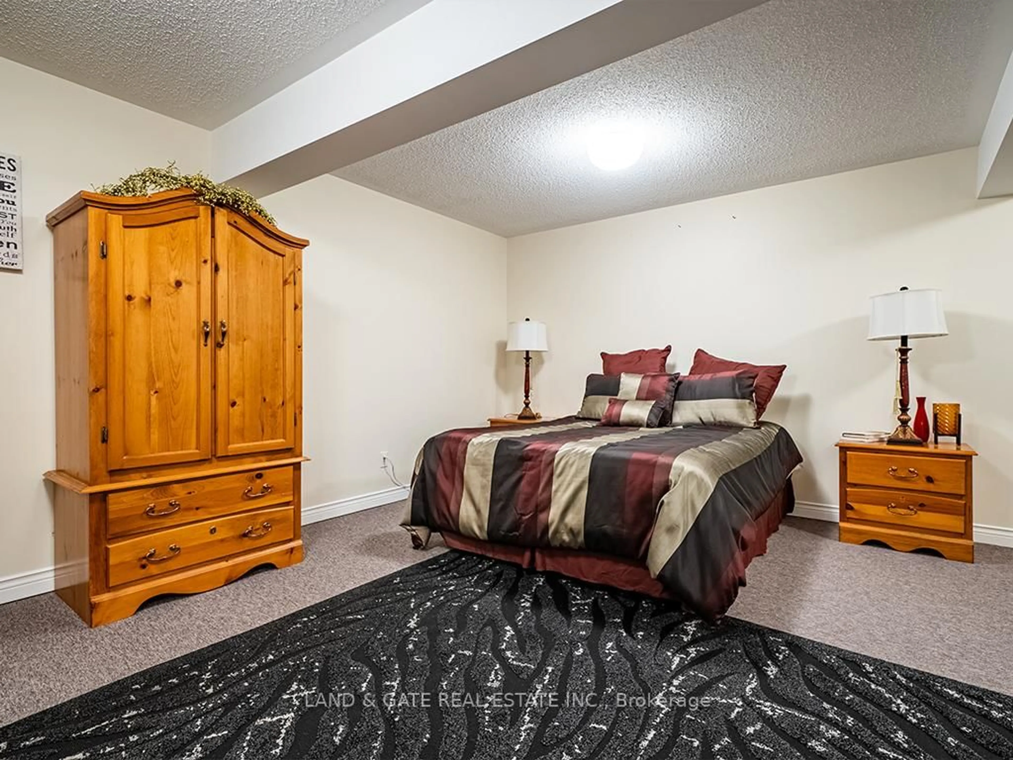 Bedroom with bed, carpet floor for 245 Elgin St #502, Cobourg Ontario K9A 5M1