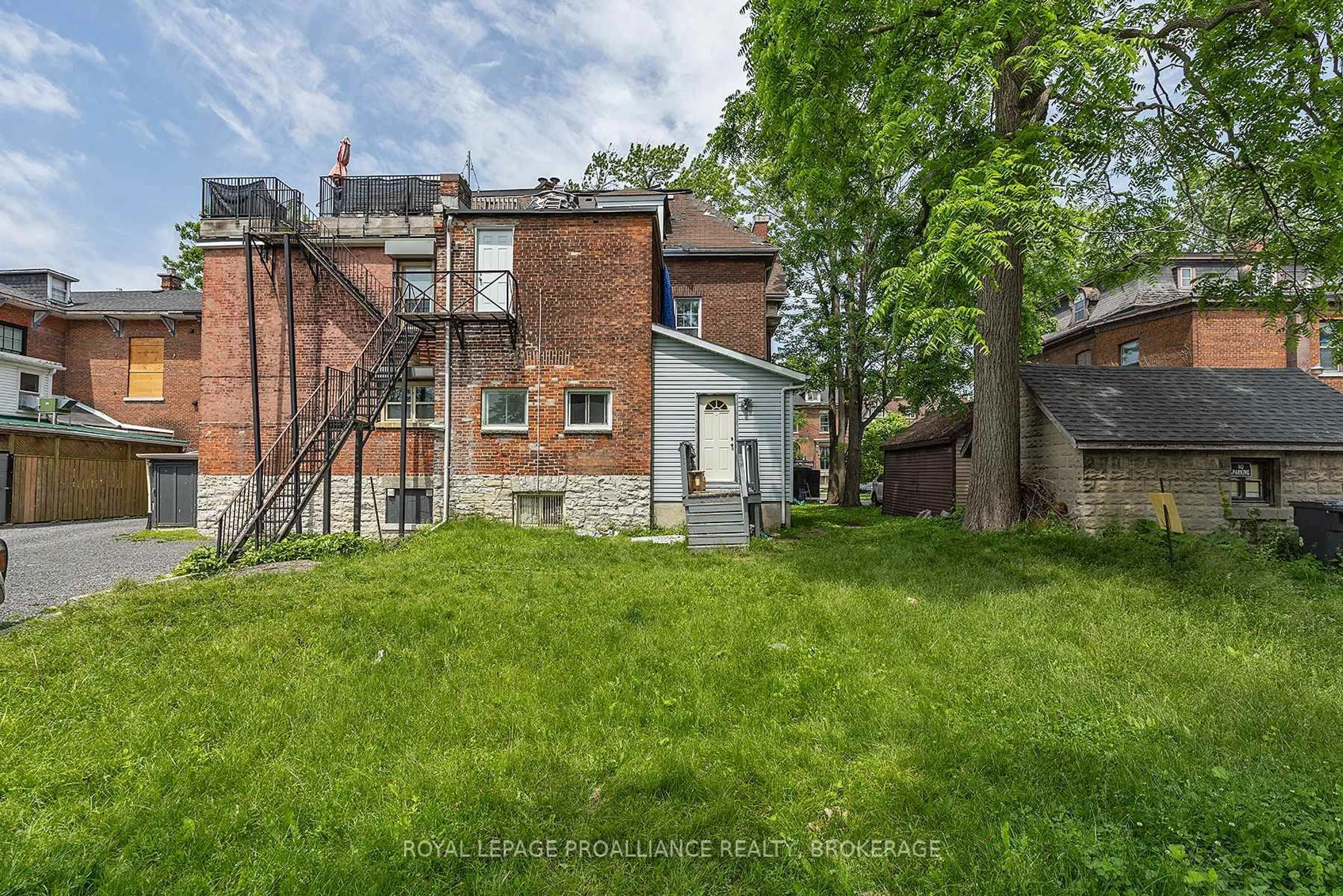 A pic from outside/outdoor area/front of a property/back of a property/a pic from drone, street for 99 Bagot St, Kingston Ontario K7L 3E6