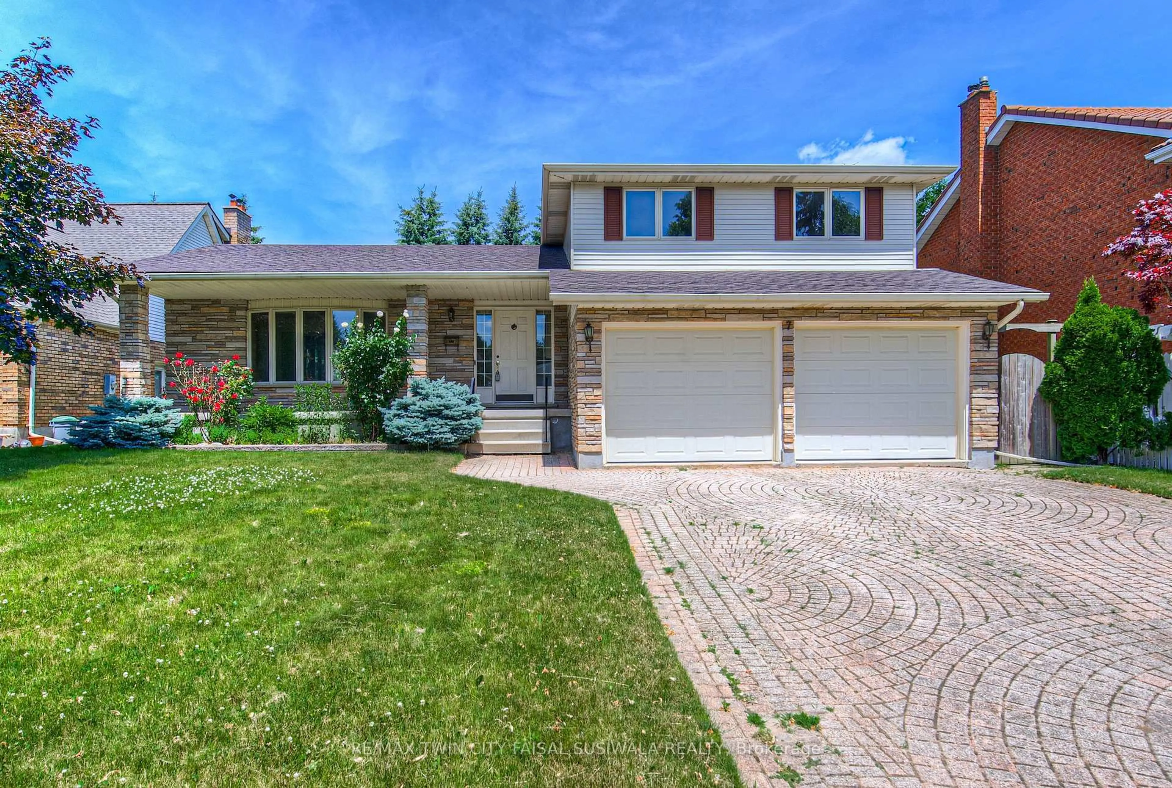 Home with brick exterior material, street for 7 Dunnington Crt, Kitchener Ontario N2A 3M5