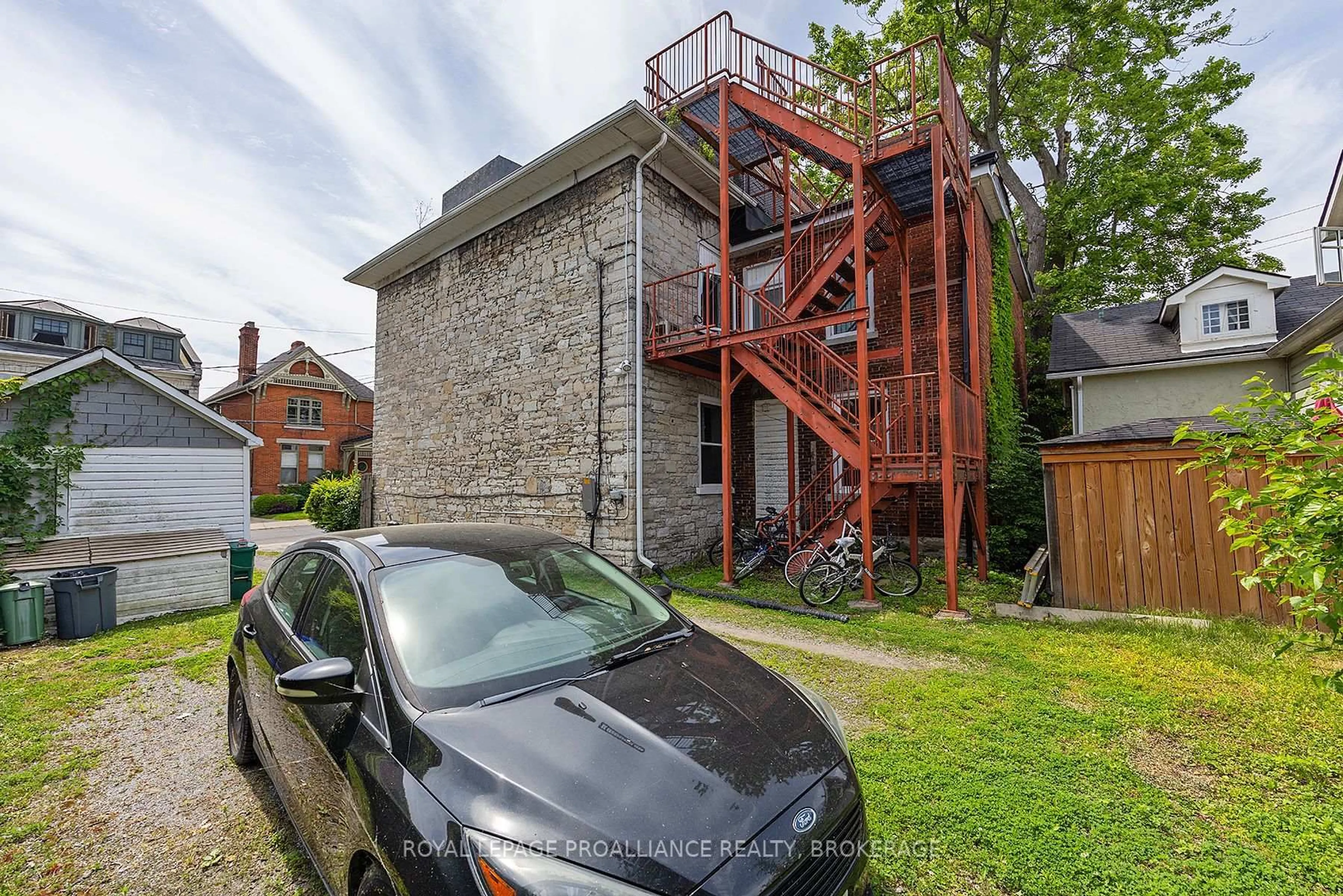 A pic from outside/outdoor area/front of a property/back of a property/a pic from drone, street for 63 William St, Kingston Ontario K7L 2C3