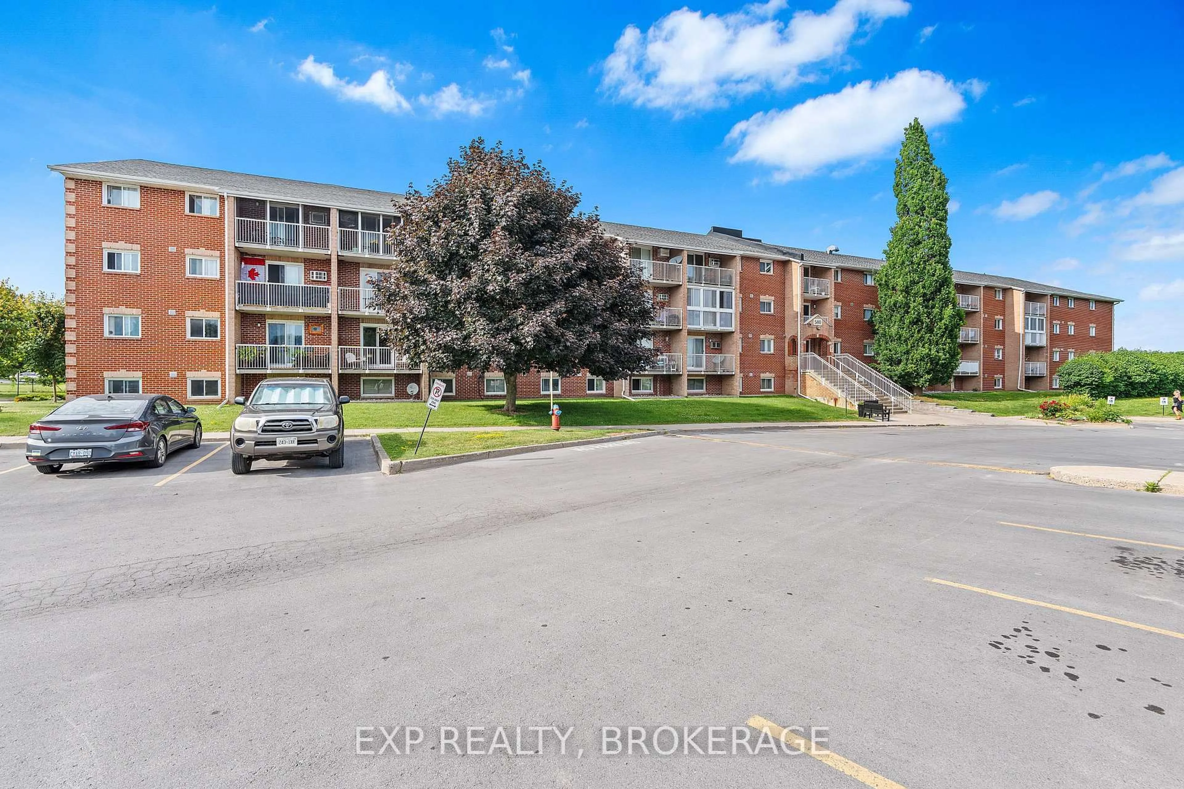 A pic from outside/outdoor area/front of a property/back of a property/a pic from drone, unknown for 580 ARMSTRONG Rd #203, Kingston Ontario K7M 8M3