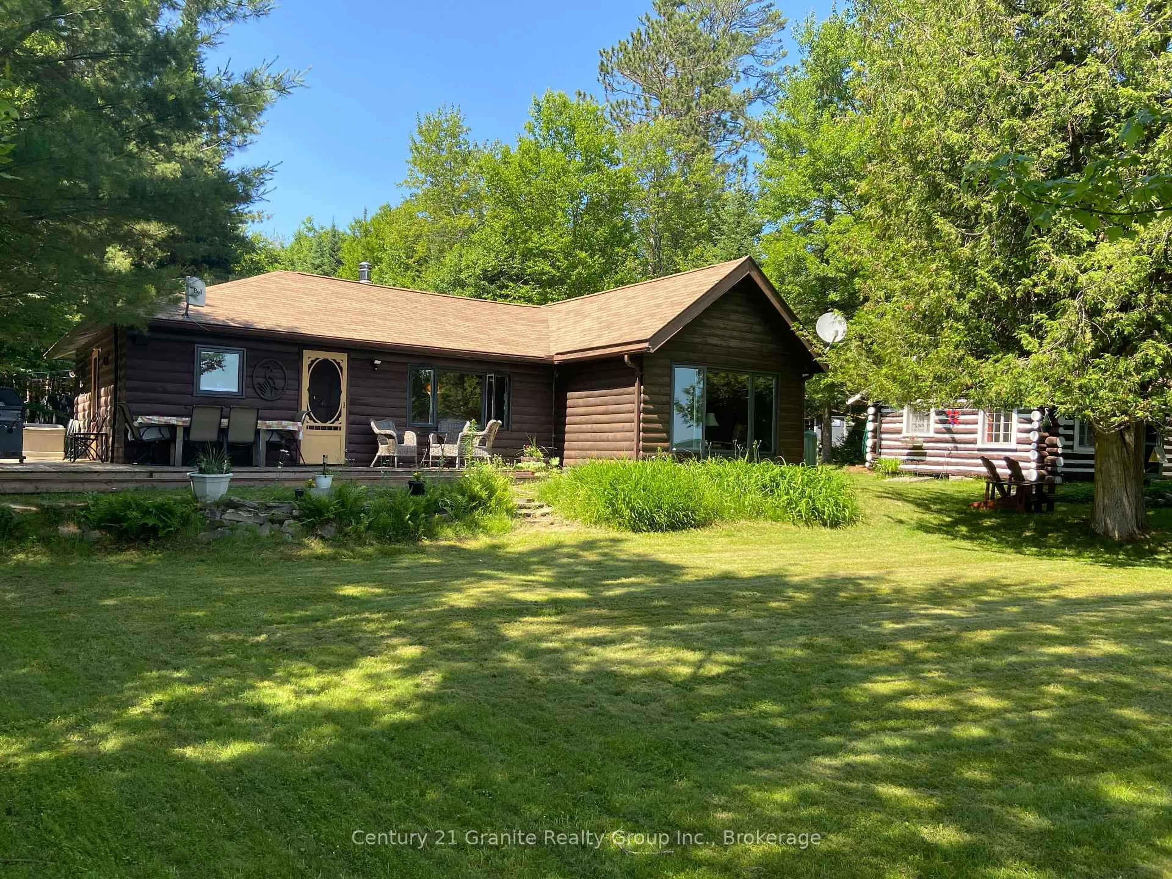 A pic from outside/outdoor area/front of a property/back of a property/a pic from drone, water/lake/river/ocean view for 1272 Reynolds Rd, Minden Hills Ontario K0M 2K0