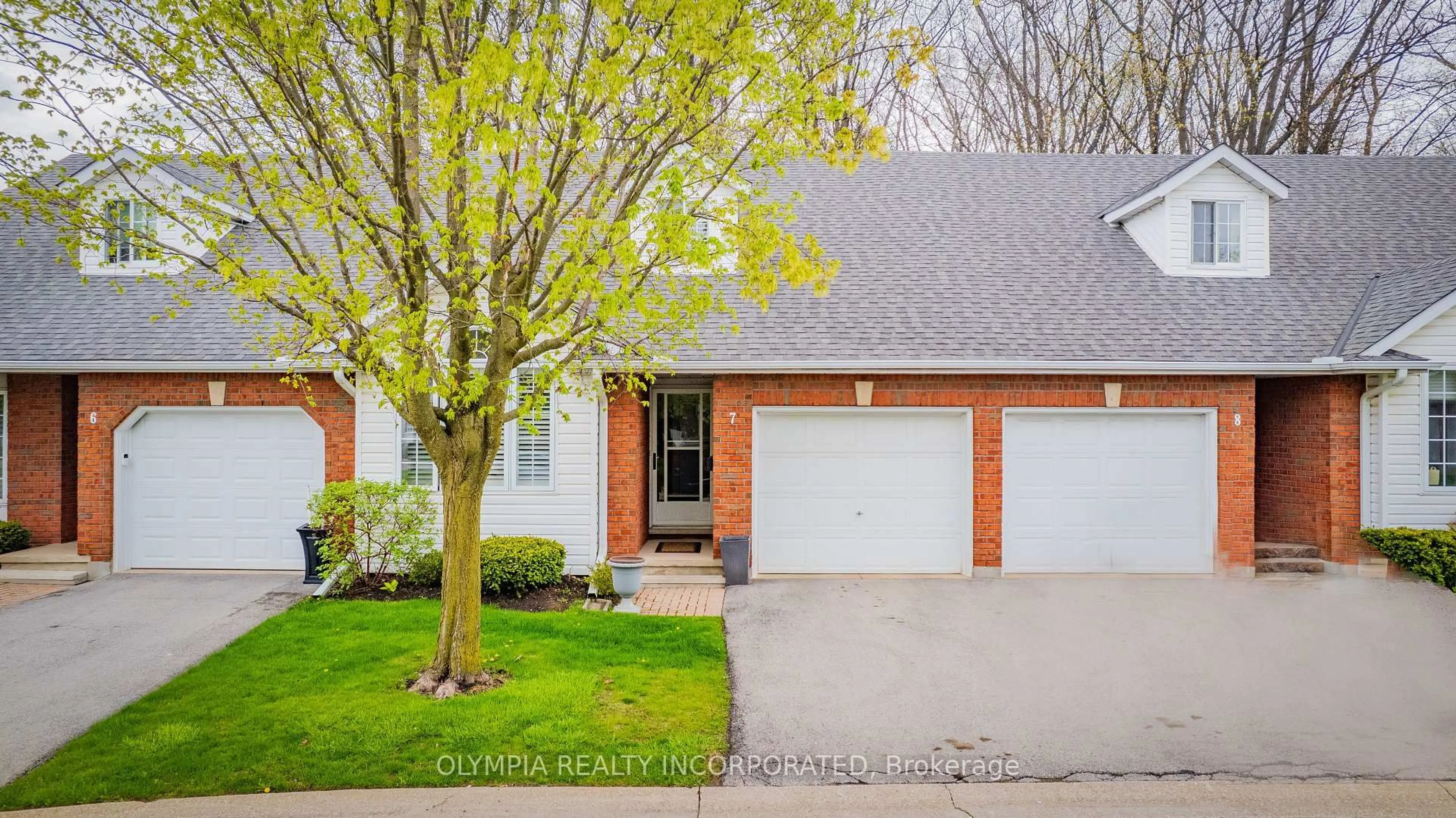 Home with brick exterior material, street for 7370 Monastery Dr #7, Niagara Falls Ontario L2H 3C4