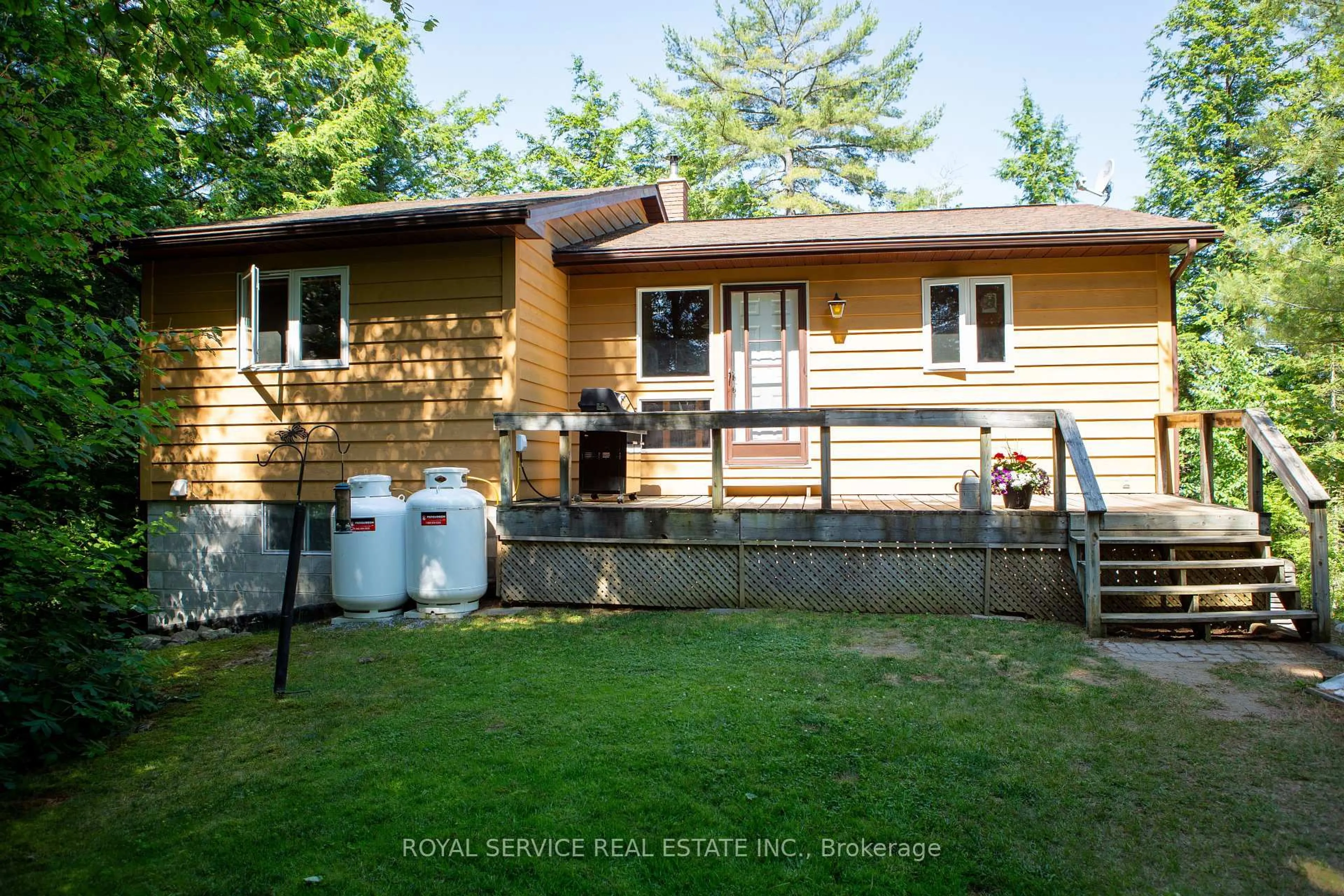 Home with vinyl exterior material, street for 1317 Abrams Rd, Highlands East Ontario K0L 1C0