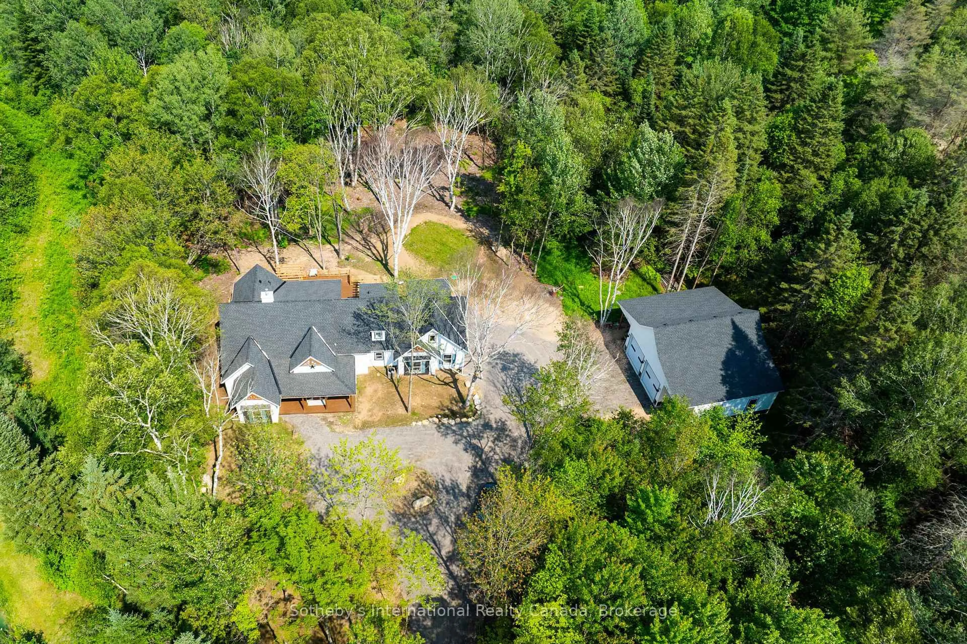 A pic from outside/outdoor area/front of a property/back of a property/a pic from drone, forest/trees view for 681 Doe Lake Rd, Armour Ontario P0A 1L0