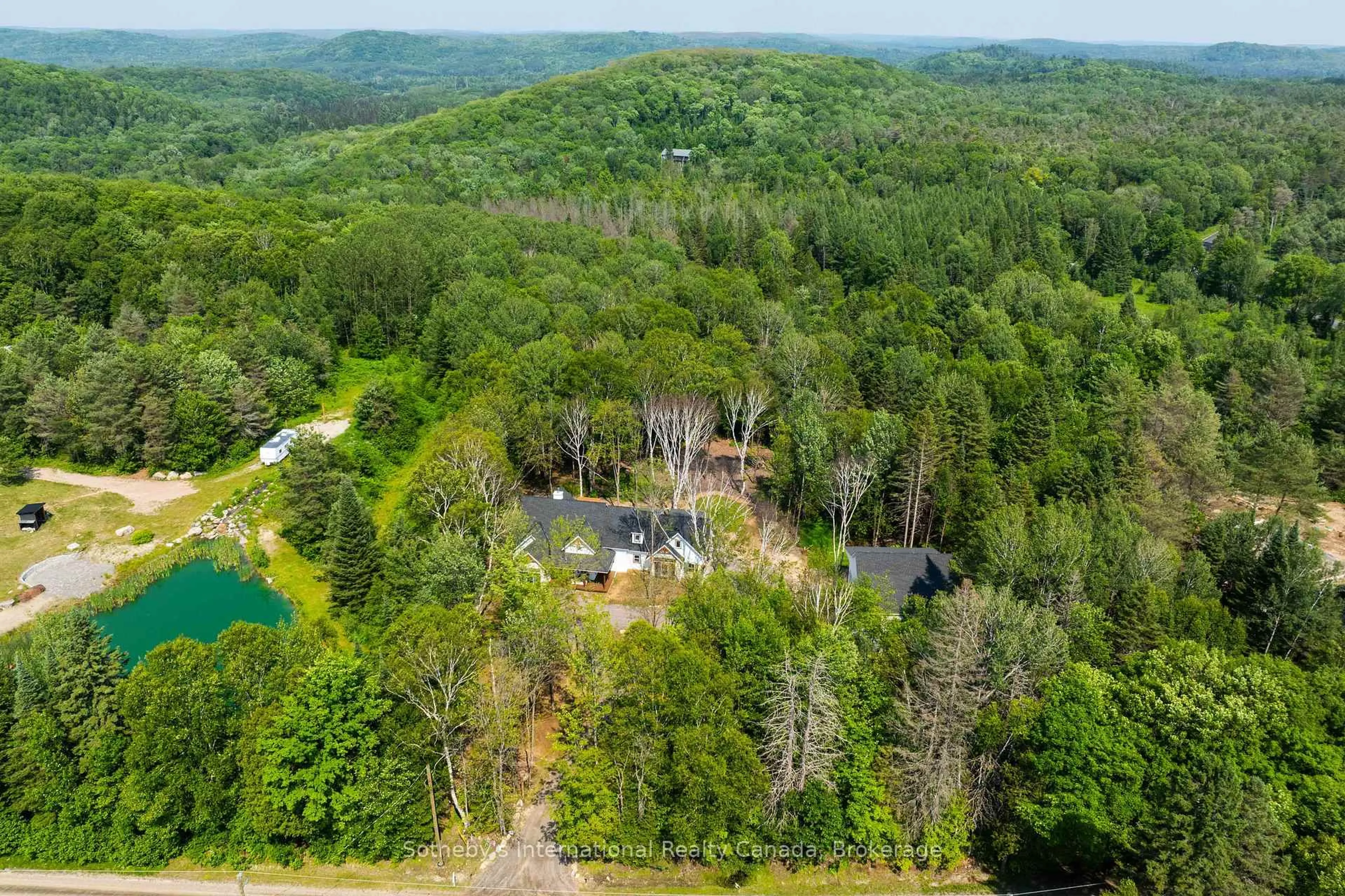 A pic from outside/outdoor area/front of a property/back of a property/a pic from drone, forest/trees view for 681 Doe Lake Rd, Armour Ontario P0A 1L0