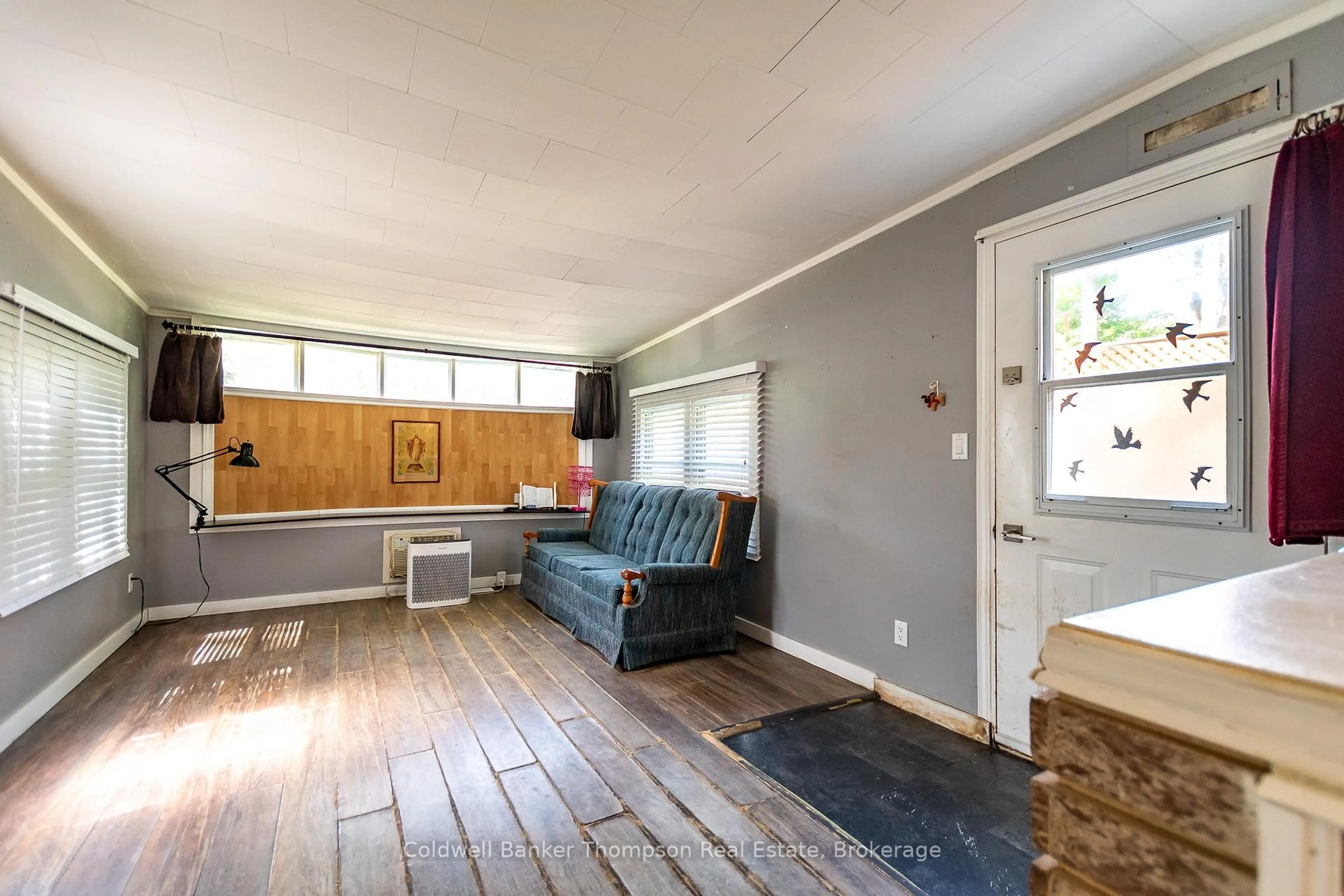 Living room with furniture, unknown for 24 Buck Ave, Huntsville Ontario P1H 2J2