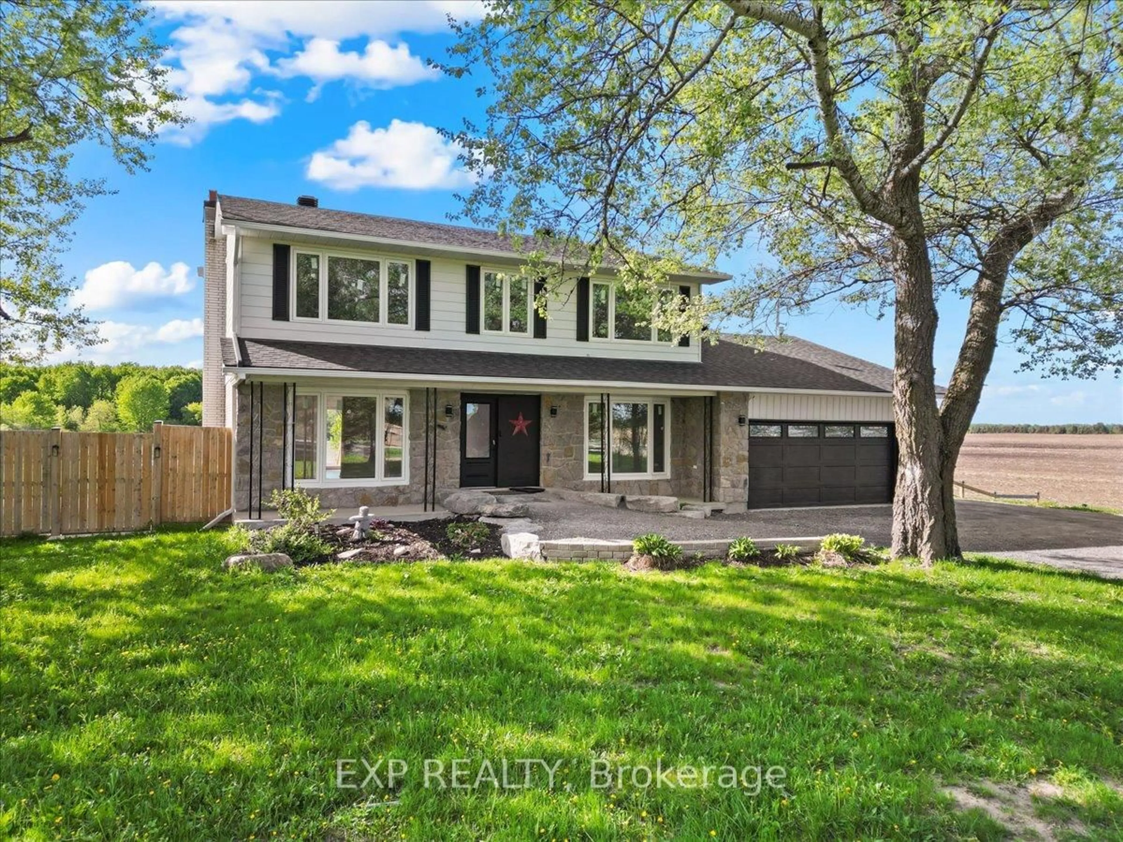 Home with vinyl exterior material, street for 2820 Harbison Rd, Richmond Ontario K0A 2Z0