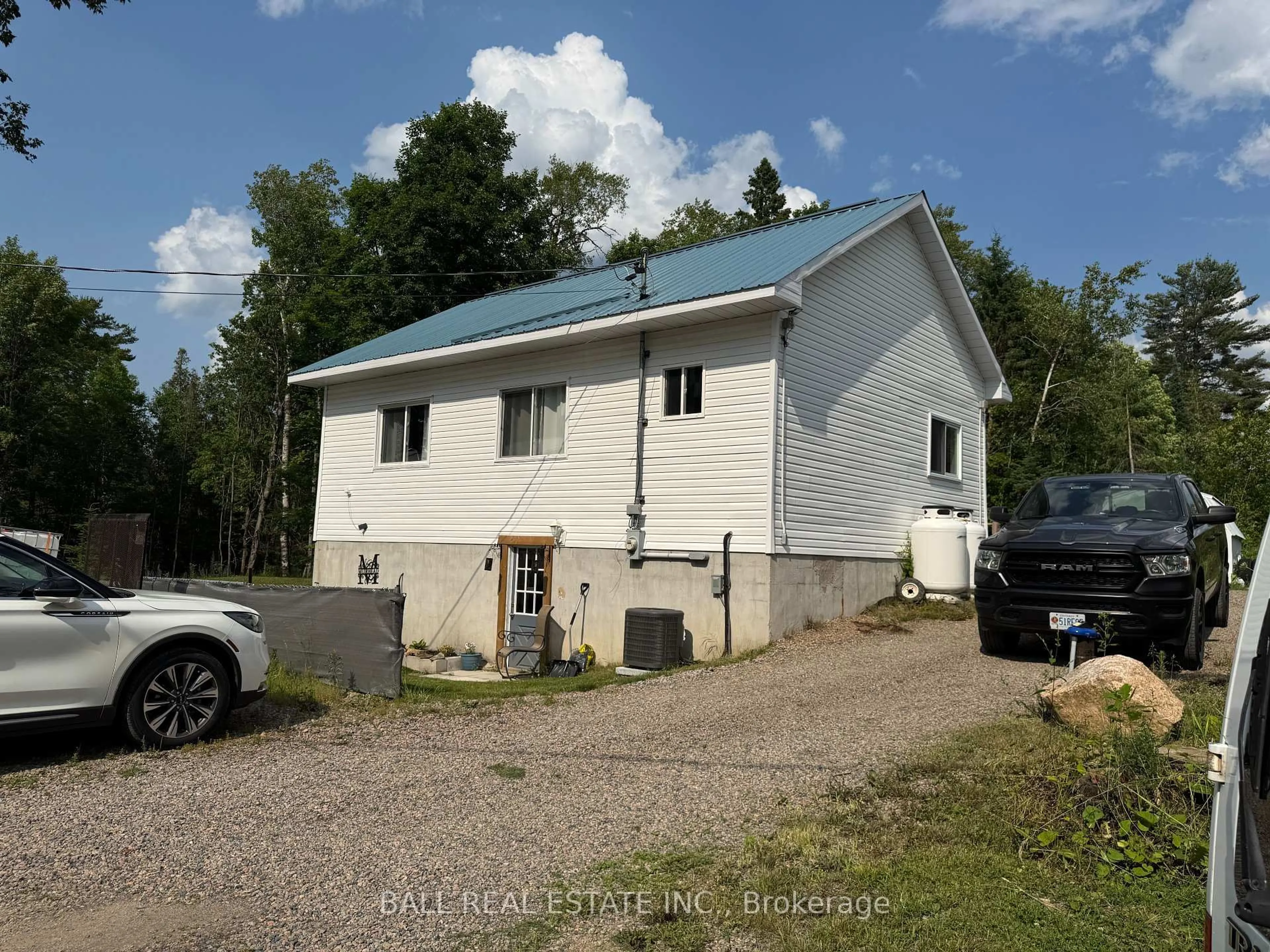 A pic from outside/outdoor area/front of a property/back of a property/a pic from drone, building for 10419 County Road 503, Highlands East Ontario K0M 1R0