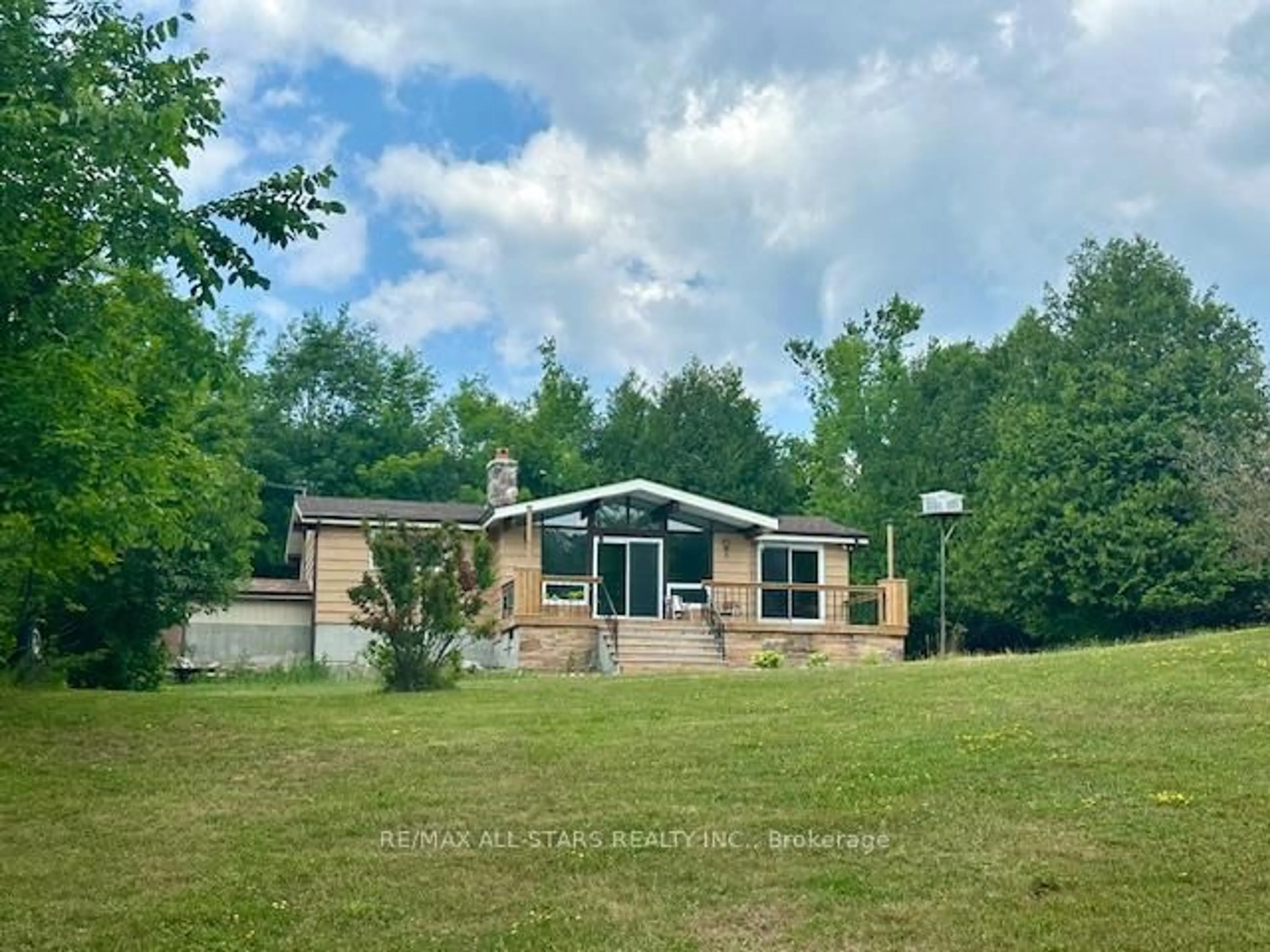 A pic from outside/outdoor area/front of a property/back of a property/a pic from drone, unknown for 1177 County Rd 36, Trent Lakes Ontario K0M 1A0