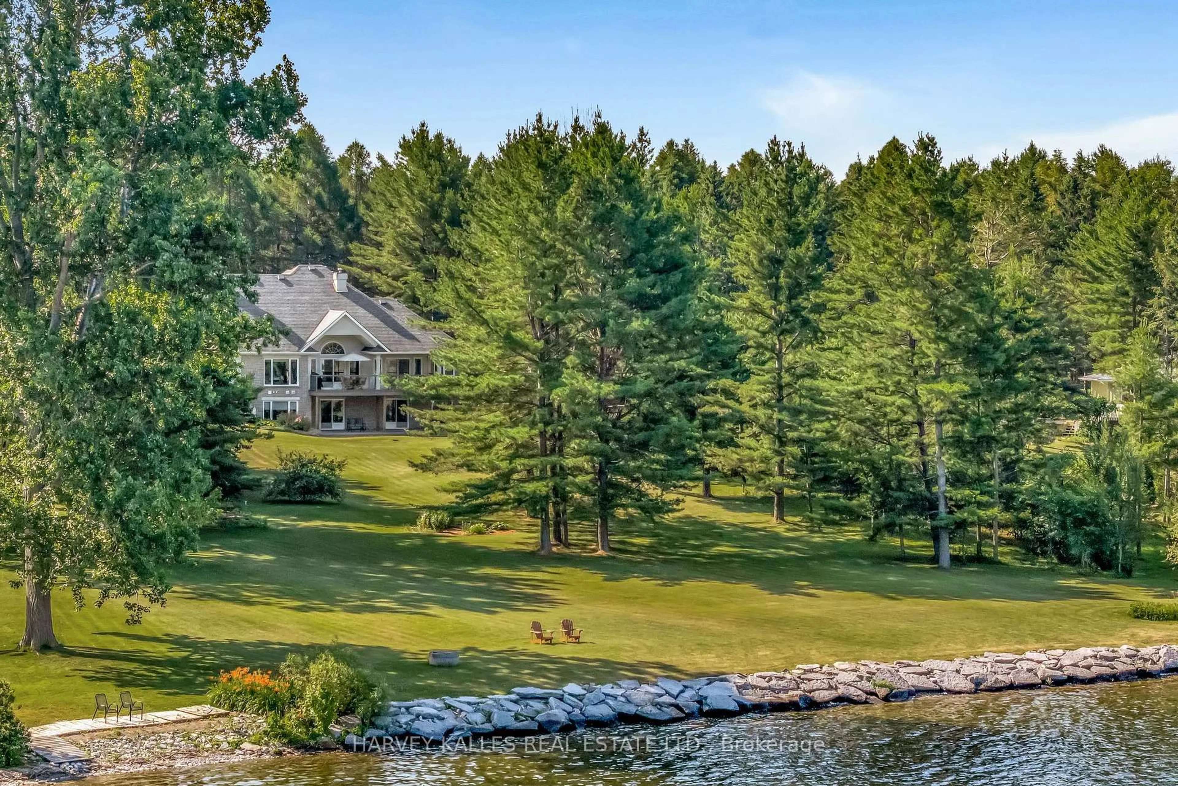 A pic from outside/outdoor area/front of a property/back of a property/a pic from drone, water/lake/river/ocean view for 3605 County Rd 7, Prince Edward County Ontario K0K 2T0