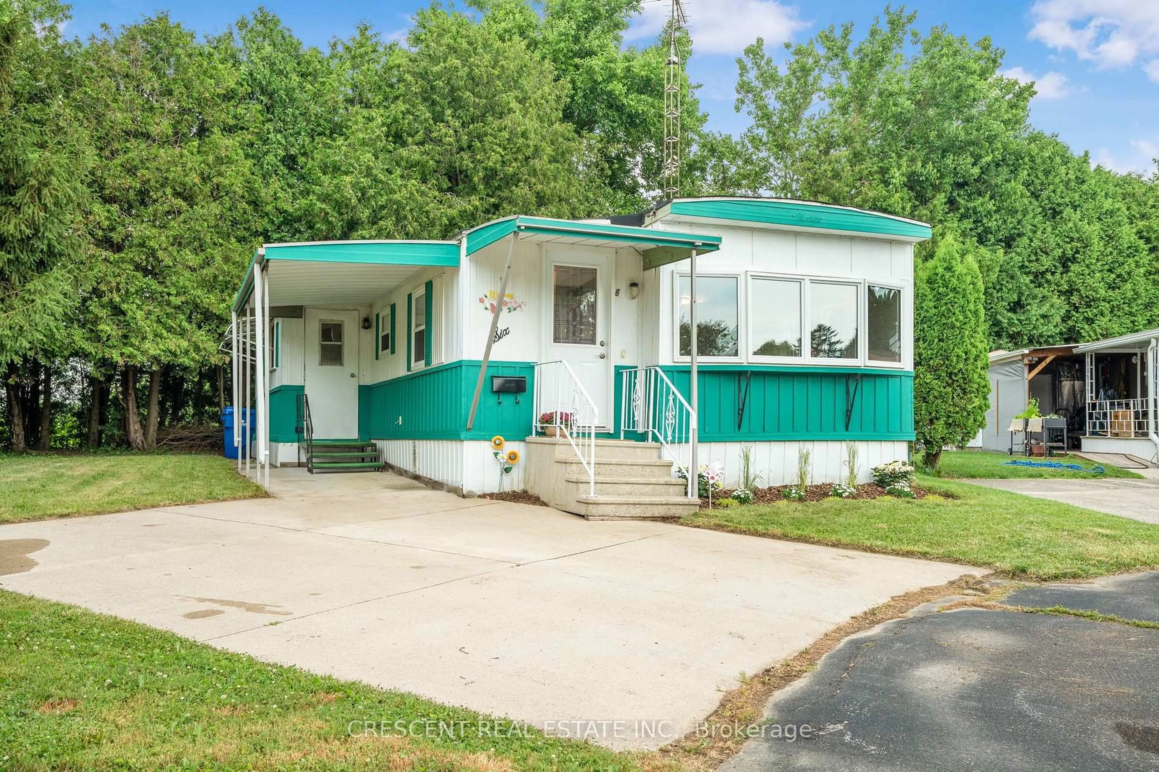 Home with vinyl exterior material, street for 22220 Charing Cross Rd #6, Chatham-Kent Ontario N7M 5V8