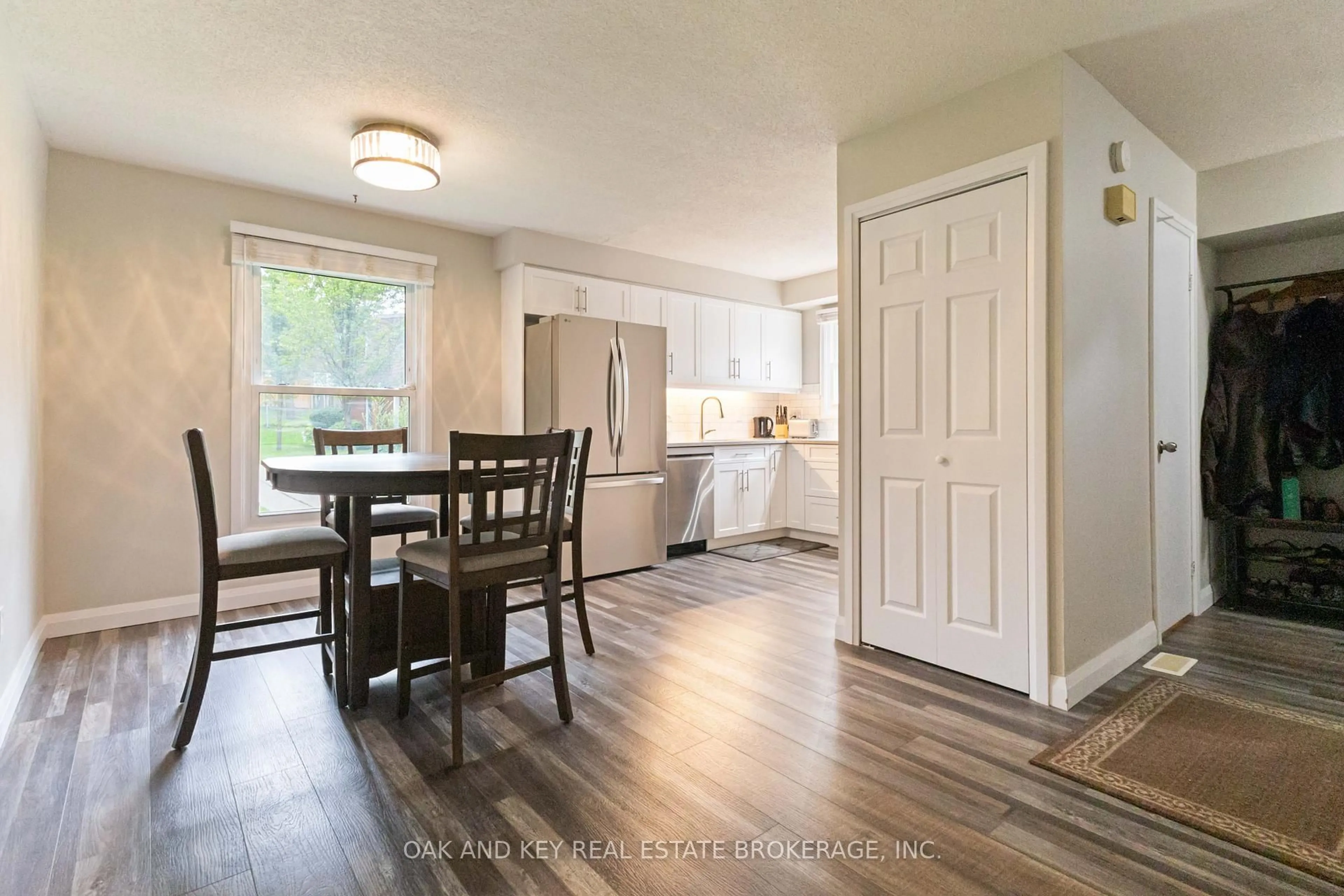 Open concept kitchen, wood/laminate floor for 134 GARDENWOOD Dr, London South Ontario N6J 3Z9