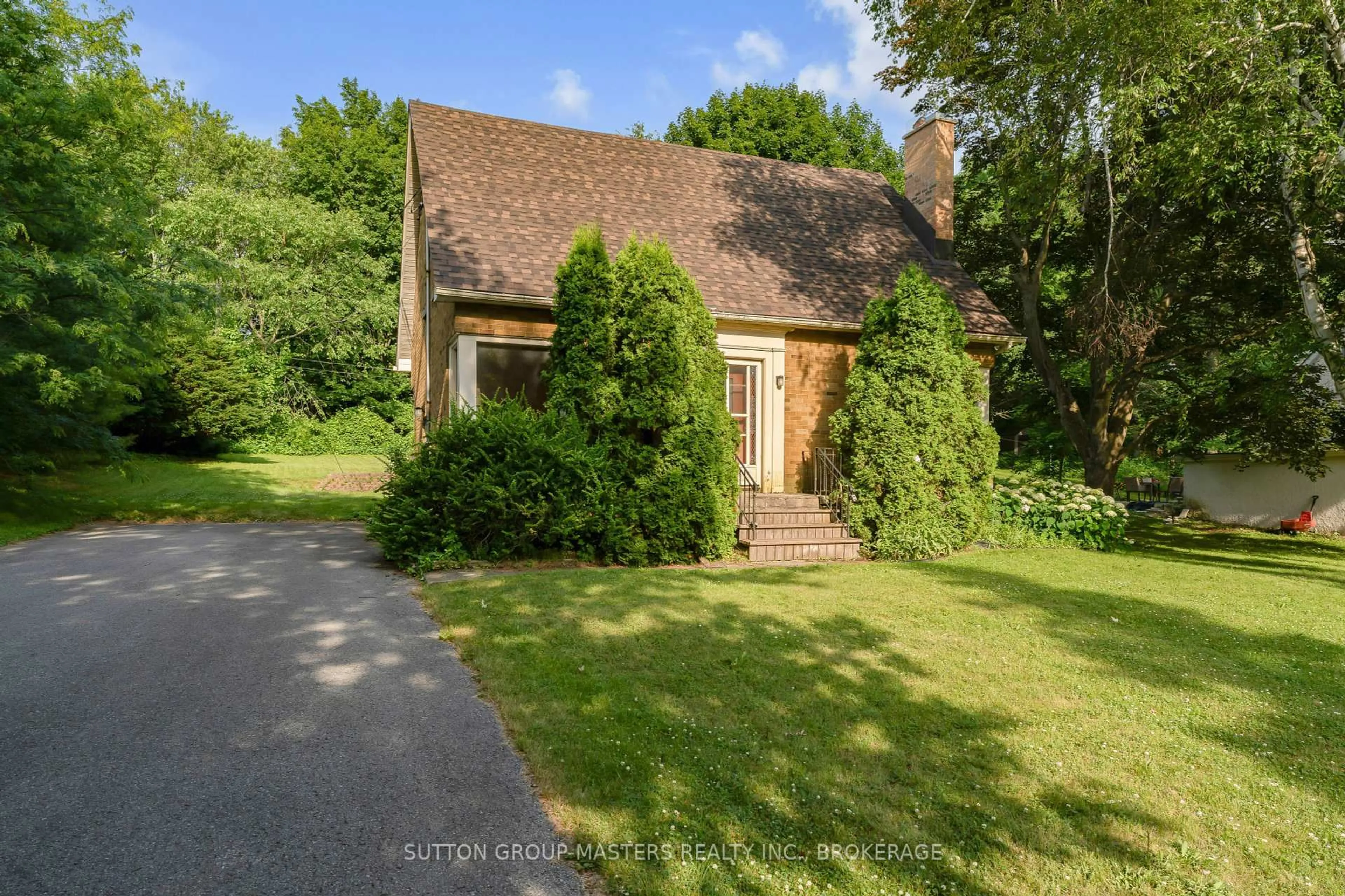 A pic from outside/outdoor area/front of a property/back of a property/a pic from drone, street for 11 Grenville Rd, Kingston Ontario K7M 2C7
