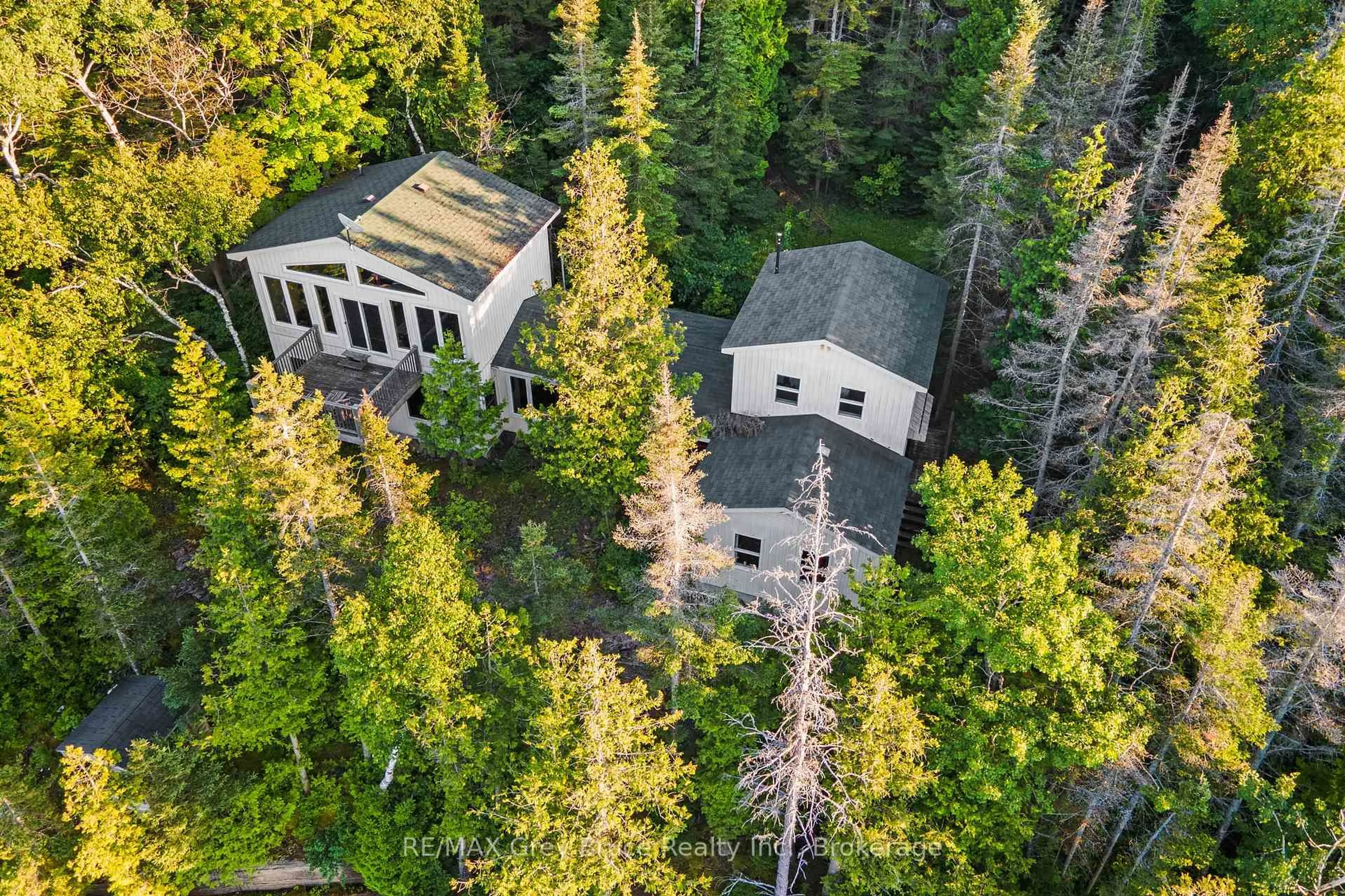 A pic from outside/outdoor area/front of a property/back of a property/a pic from drone, forest/trees view for 18 CAPE CHIN N SHORE Rd, Northern Bruce Peninsula Ontario N0H 1Z0