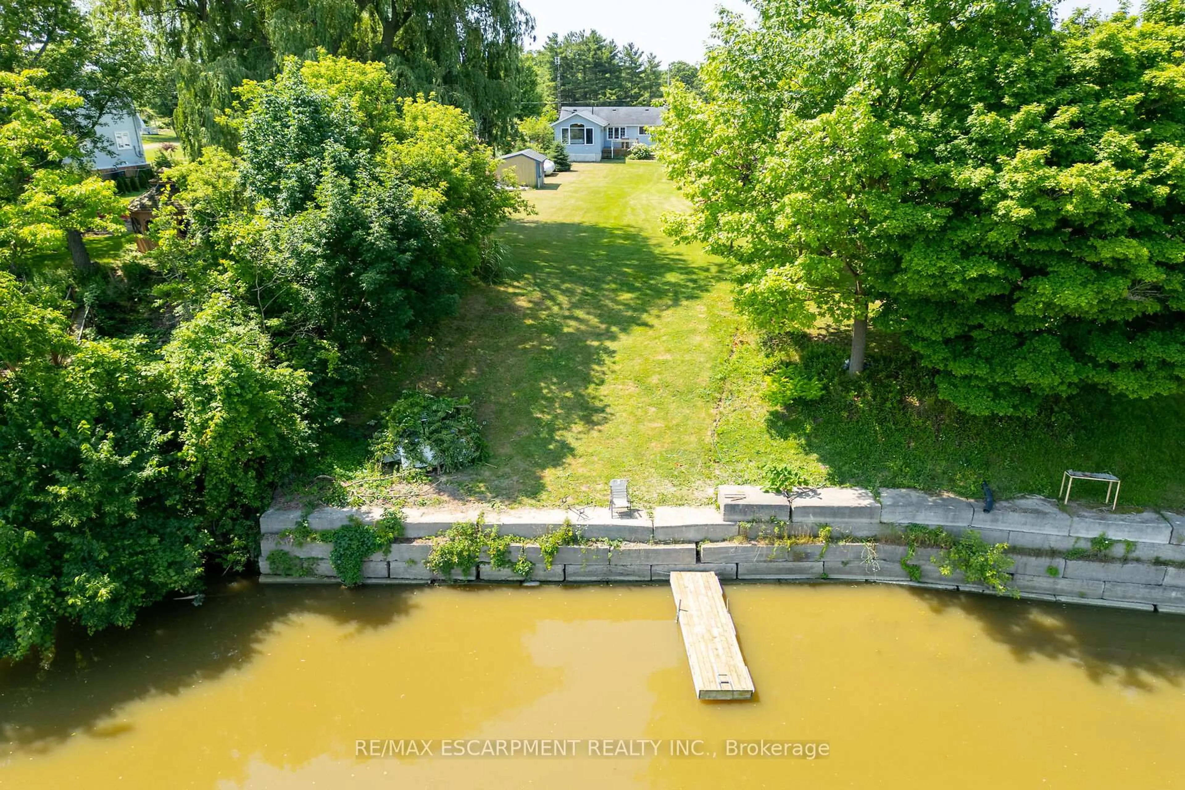 A pic from outside/outdoor area/front of a property/back of a property/a pic from drone, water/lake/river/ocean view for 1896 River Rd, Haldimand Ontario N0A 1E0