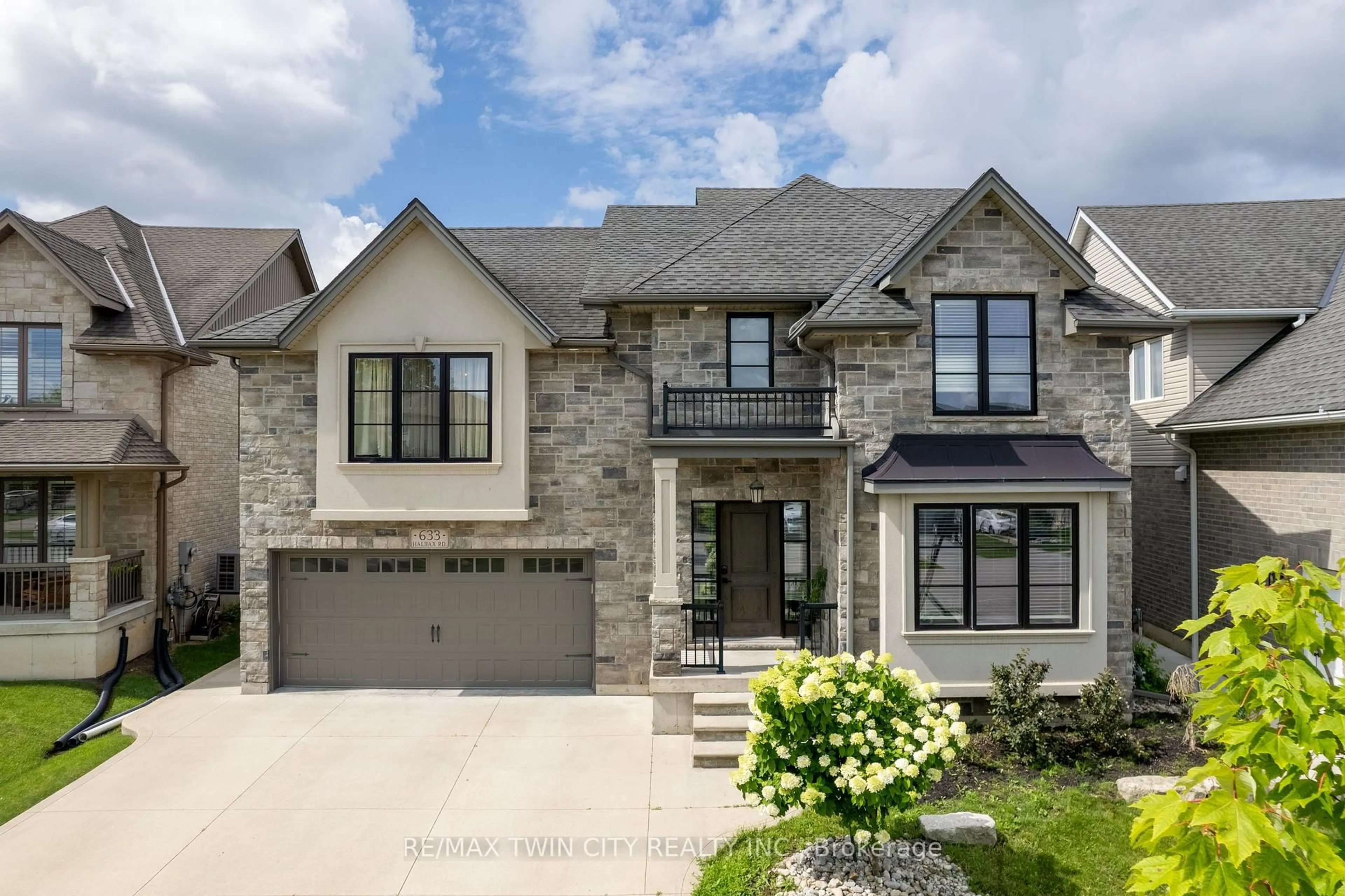 Home with brick exterior material, street for 633 Halifax Rd, Woodstock Ontario N4T 0E8