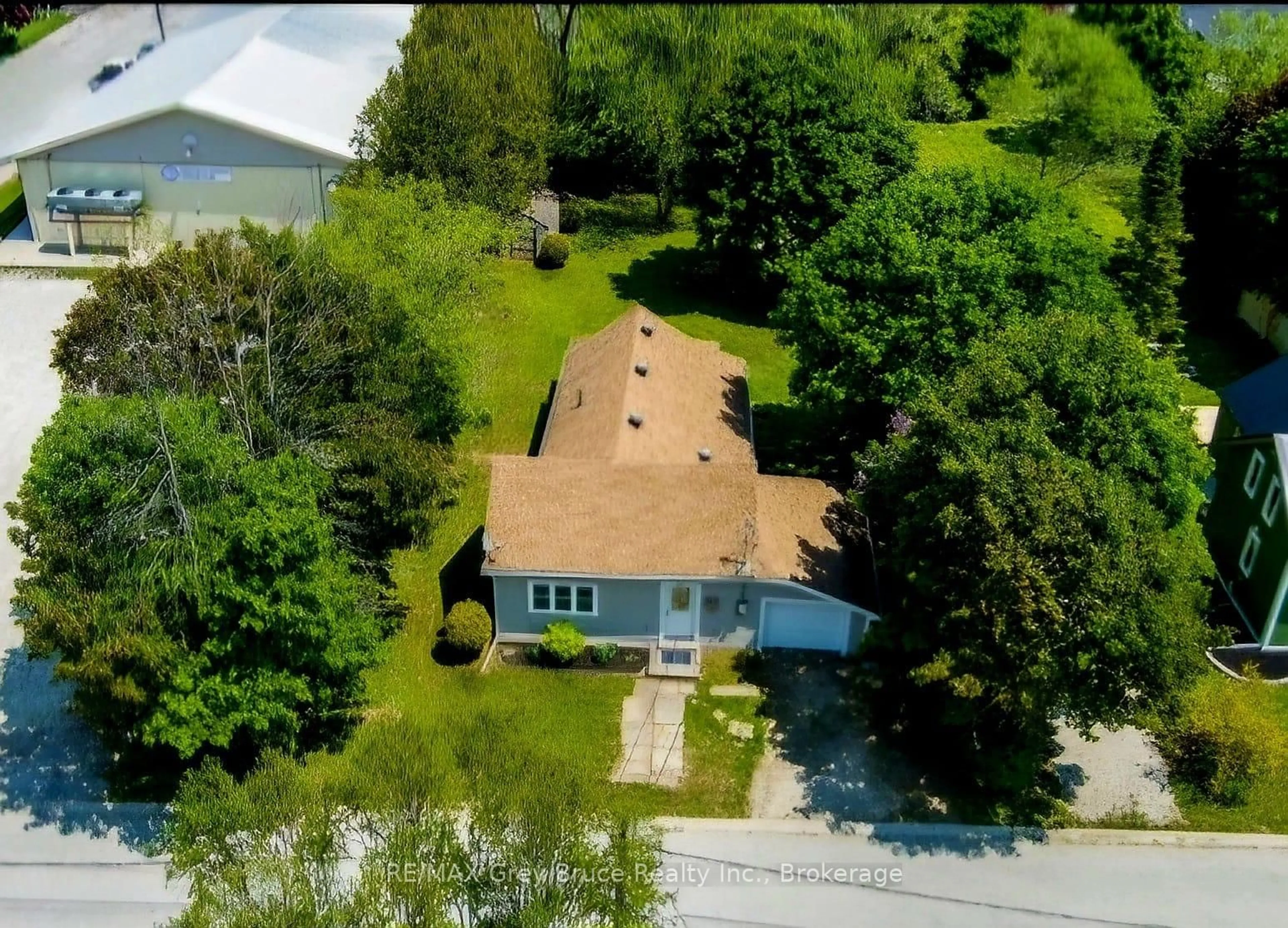 A pic from outside/outdoor area/front of a property/back of a property/a pic from drone, water/lake/river/ocean view for 523 Tyson St, South Bruce Peninsula Ontario N0H 2T0