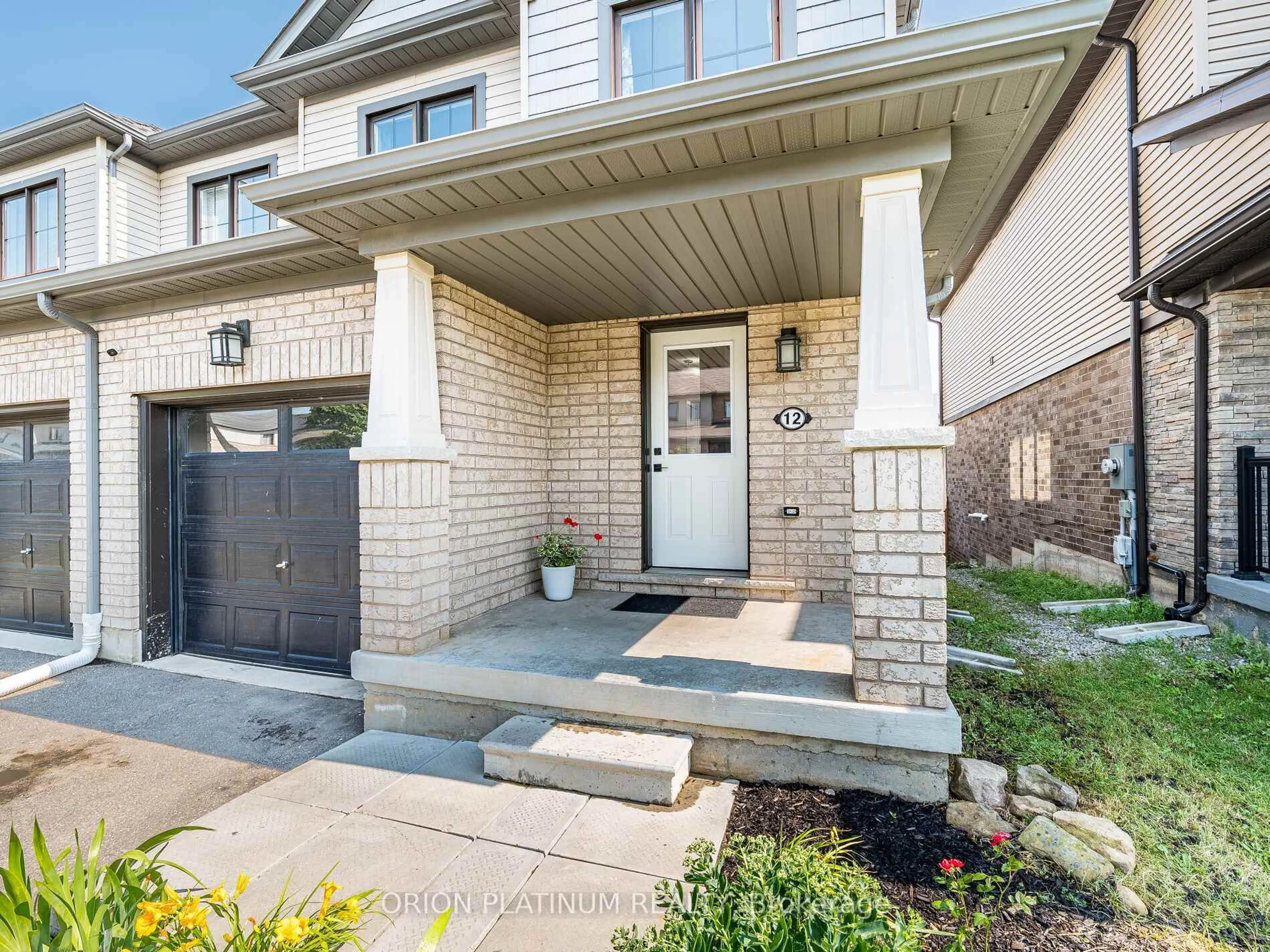 Home with brick exterior material, street for 12 Bradshaw Dr, Hamilton Ontario L8J 0K7