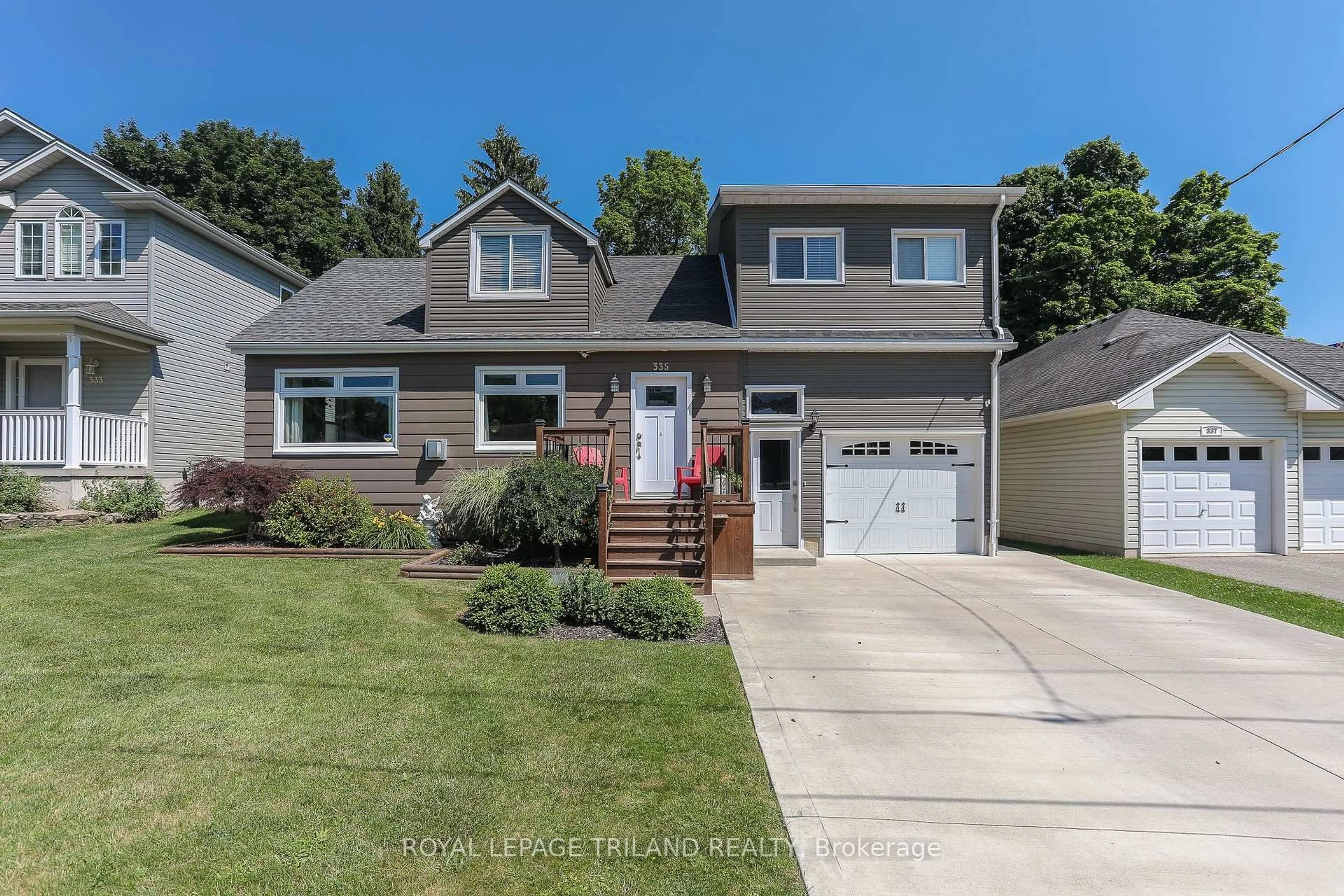 Home with vinyl exterior material, street for 335 Kendall Ave, Woodstock Ontario N4S 2B7