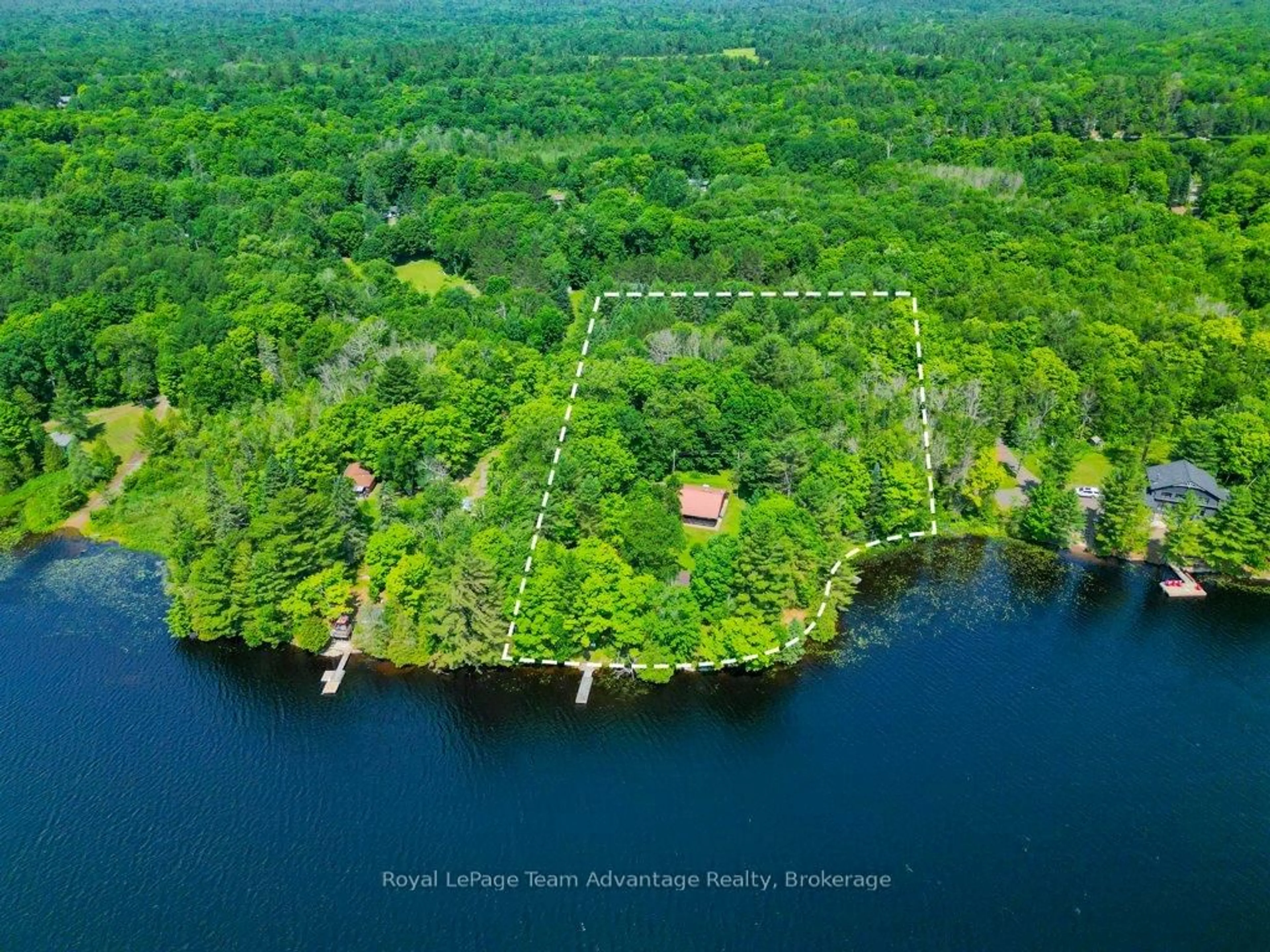 A pic from outside/outdoor area/front of a property/back of a property/a pic from drone, water/lake/river/ocean view for 11 Birch Lane, McDougall Ontario P2A 2W7