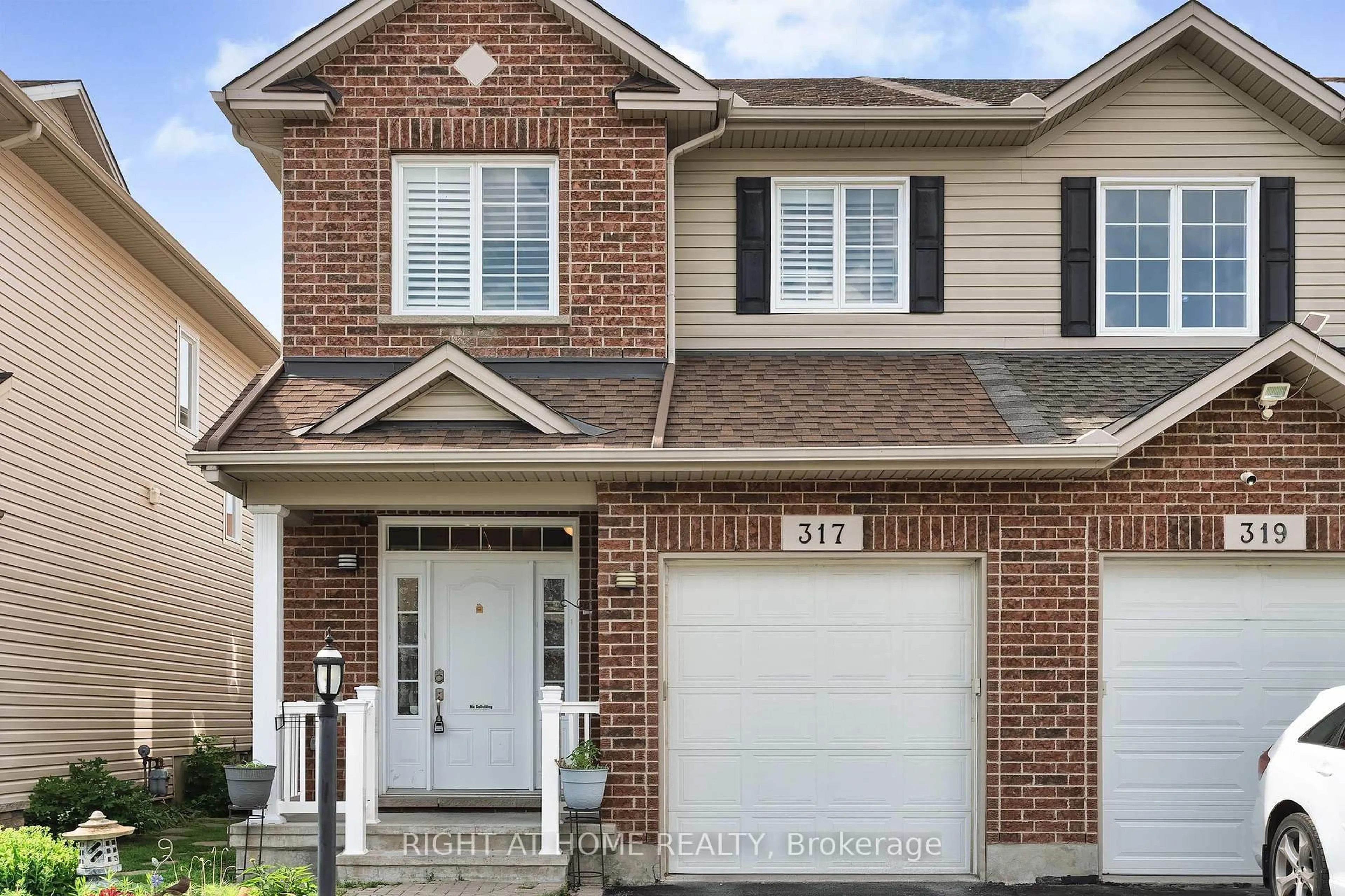 Home with brick exterior material, street for 317 Glenbrae Ave, Ottawa Ontario K2W 0B9