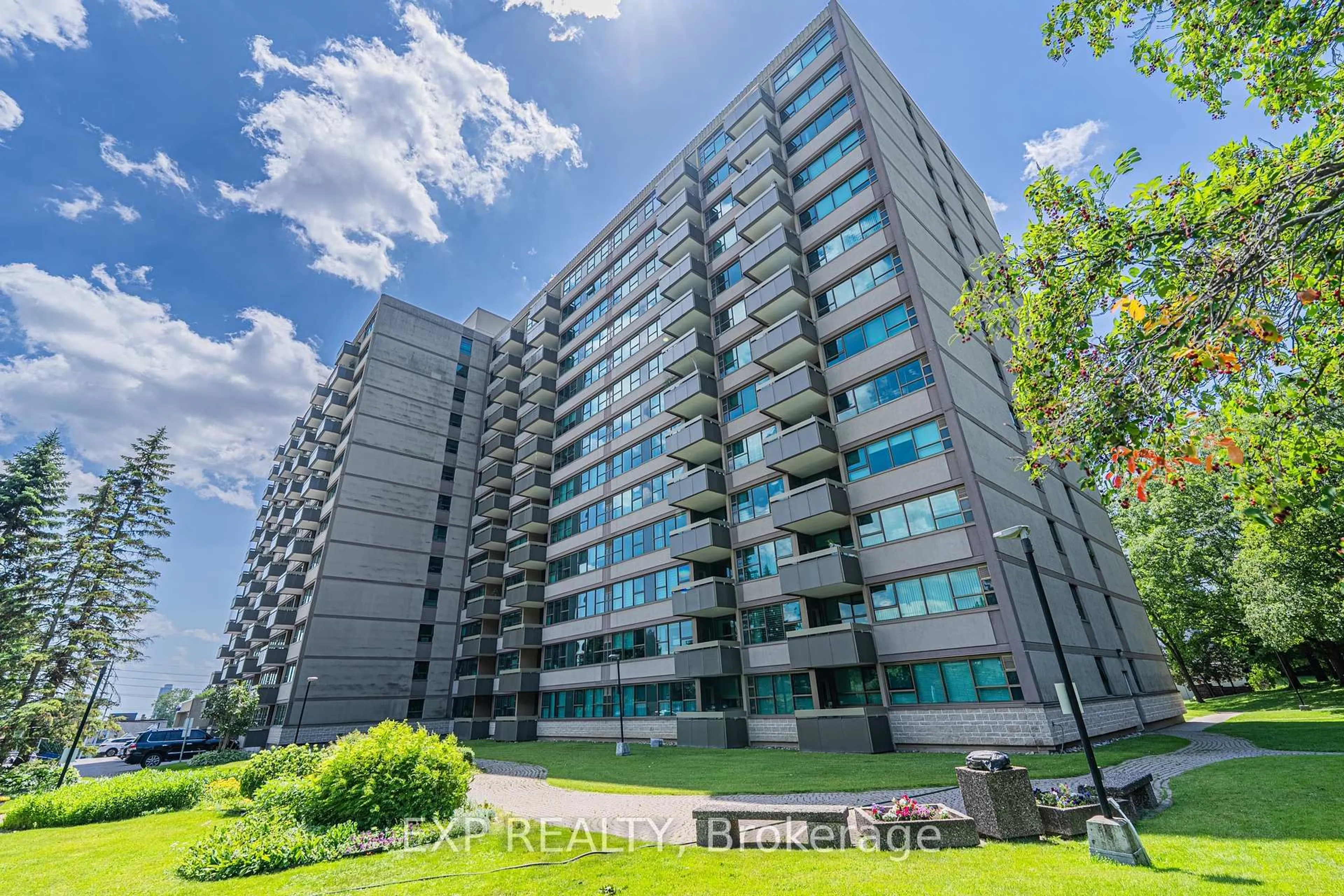 A pic from outside/outdoor area/front of a property/back of a property/a pic from drone, building for 555 BRITTANY Dr #1111, Ottawa Ontario K1K 4C5