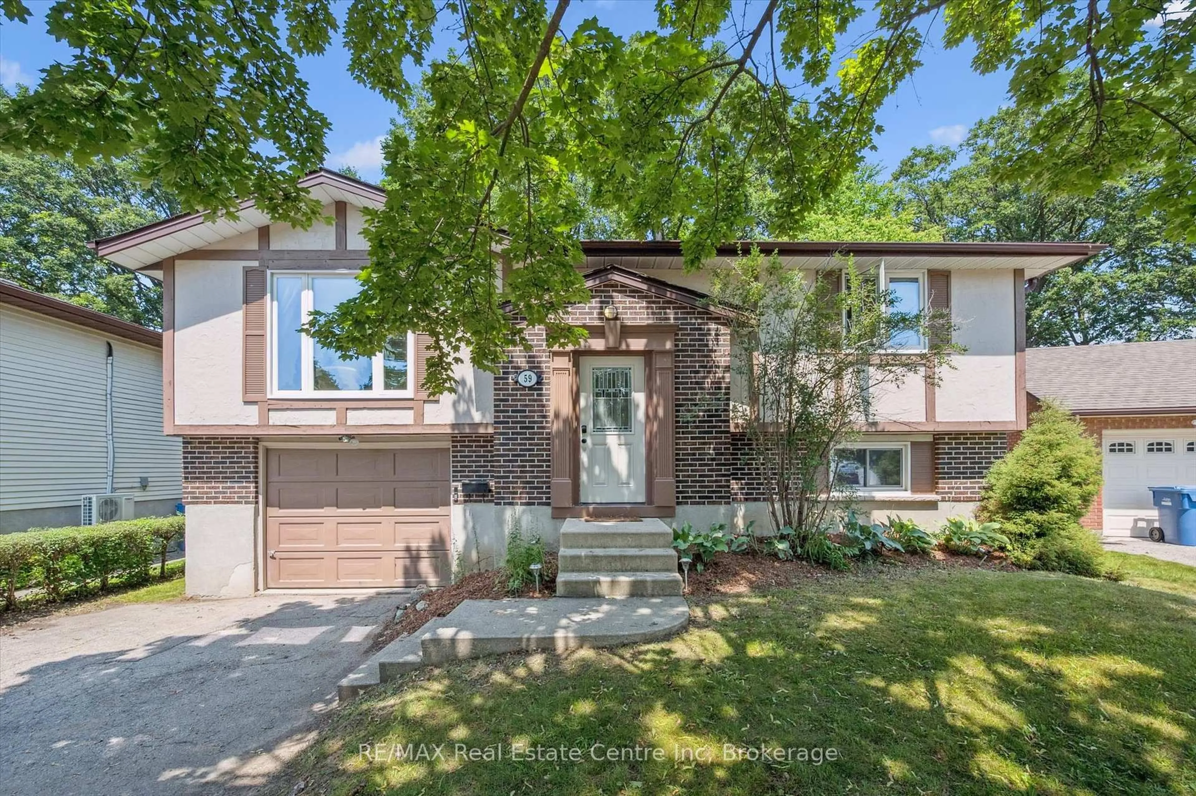 Home with brick exterior material, street for 59 Steffler Dr, Guelph Ontario N1G 3L5