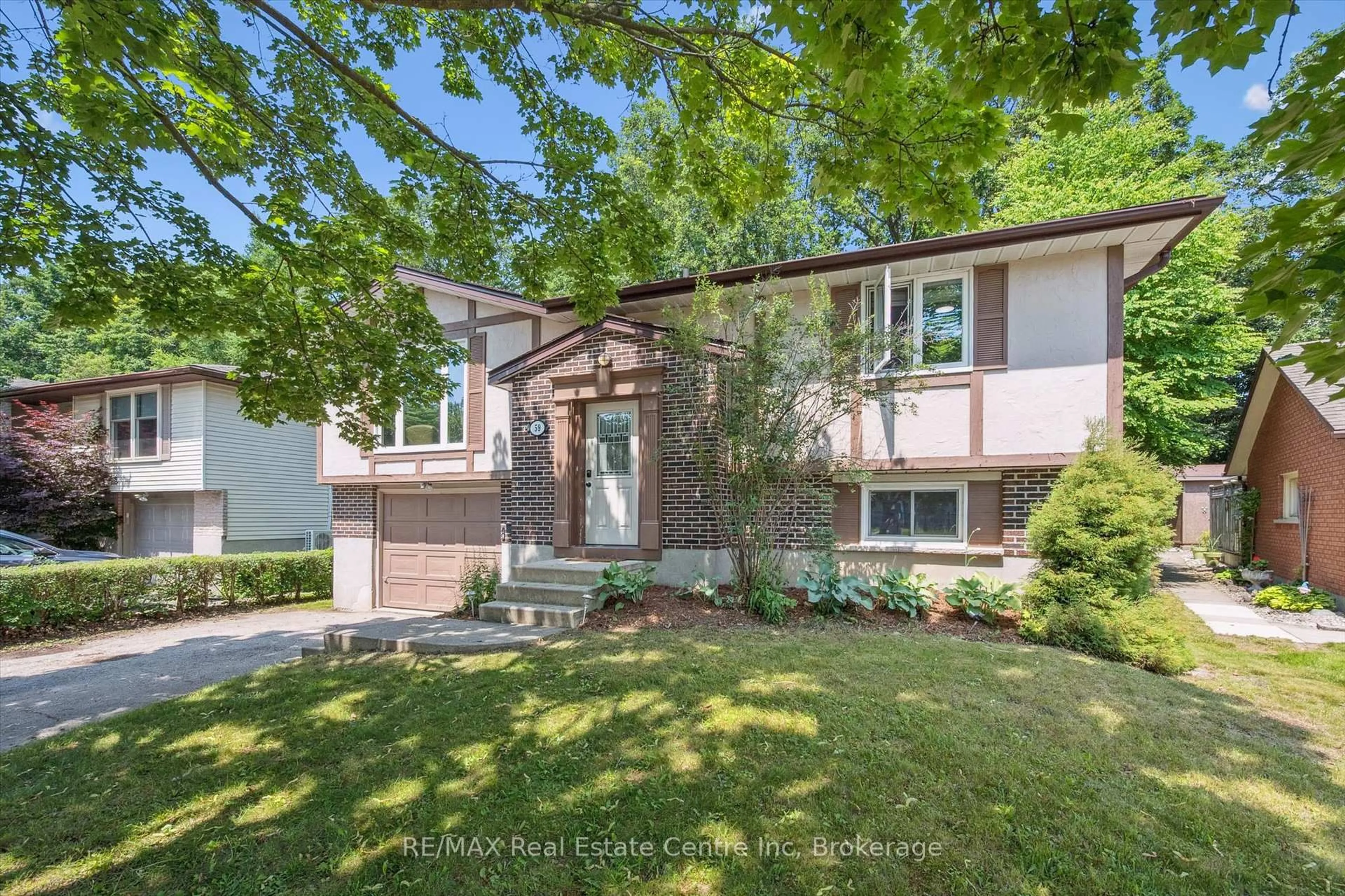 Home with vinyl exterior material, street for 59 Steffler Dr, Guelph Ontario N1G 3L5